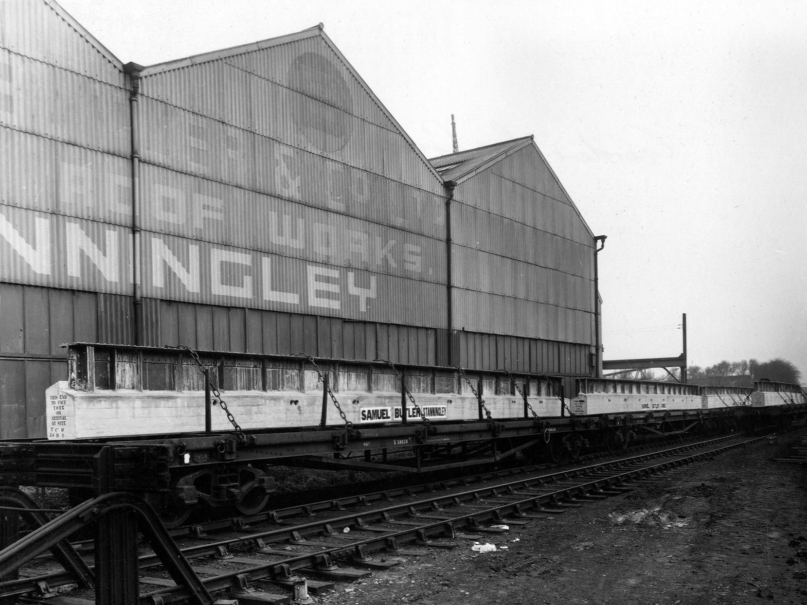 A view of the railway sidings outside Samuel Butler & Co Ltd at their Albion works in Stanningley. The wagons are loaded with bridge girders ready for delivery to the new bridge at Cross Gates.