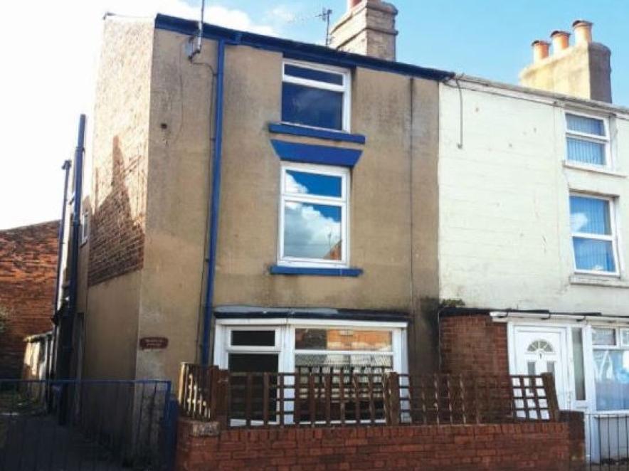 This three-bedroom end of terrace house is being sold at auction on February 6 by Auction House North West. The guide price is 50,000.