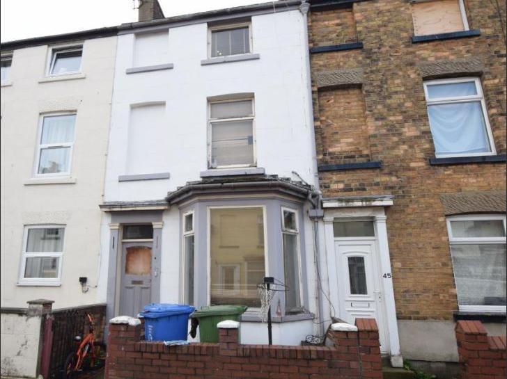 A three-bedroom terraced house for sale for 99,950. It has an enclosed rear year, walk-in-wardrobe space, two reception rooms and is being sold with no onward chain.