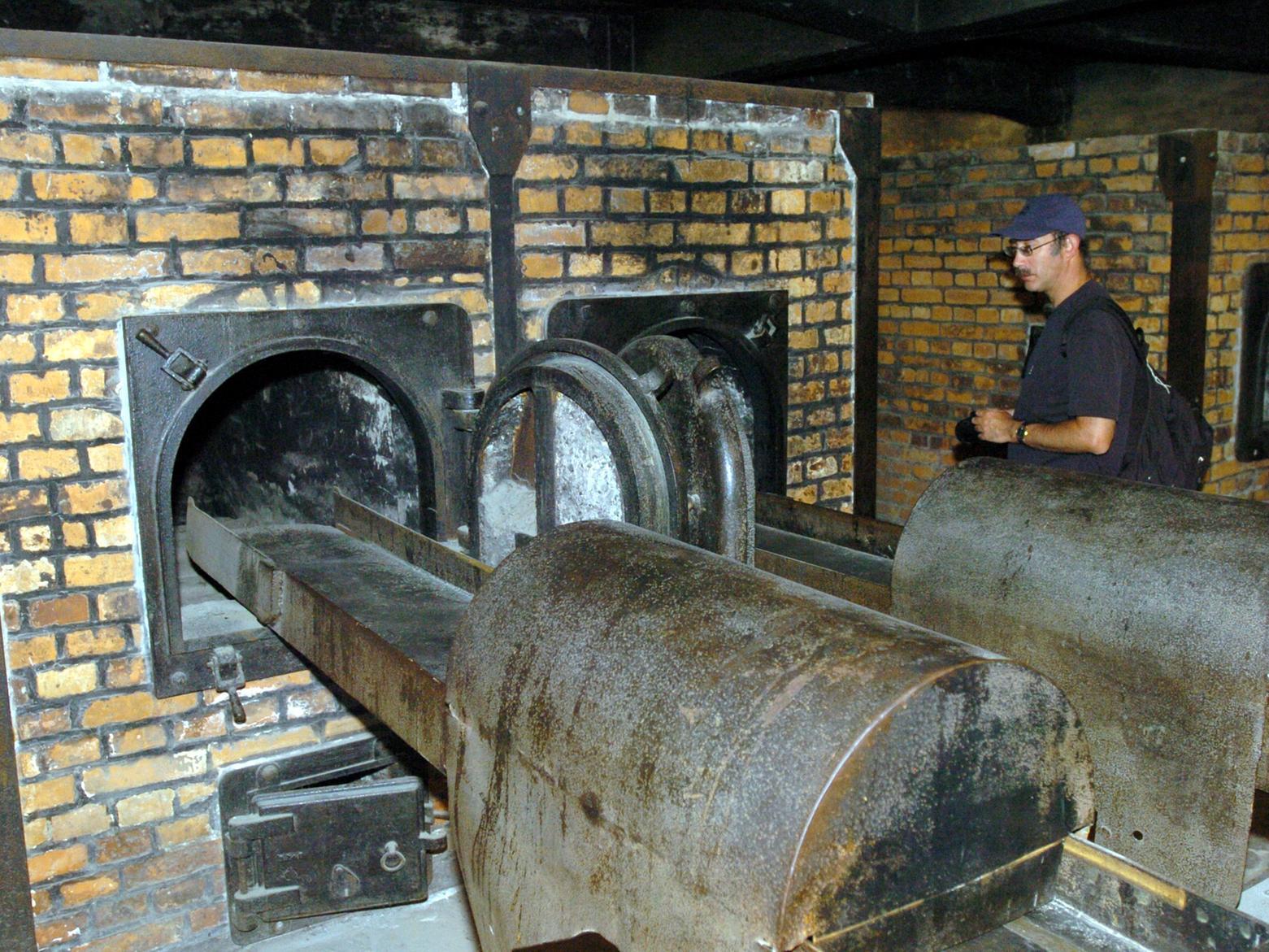 Murray Shiffeldrin pauses by the oven used to destroy the evidence of the gas chambers.