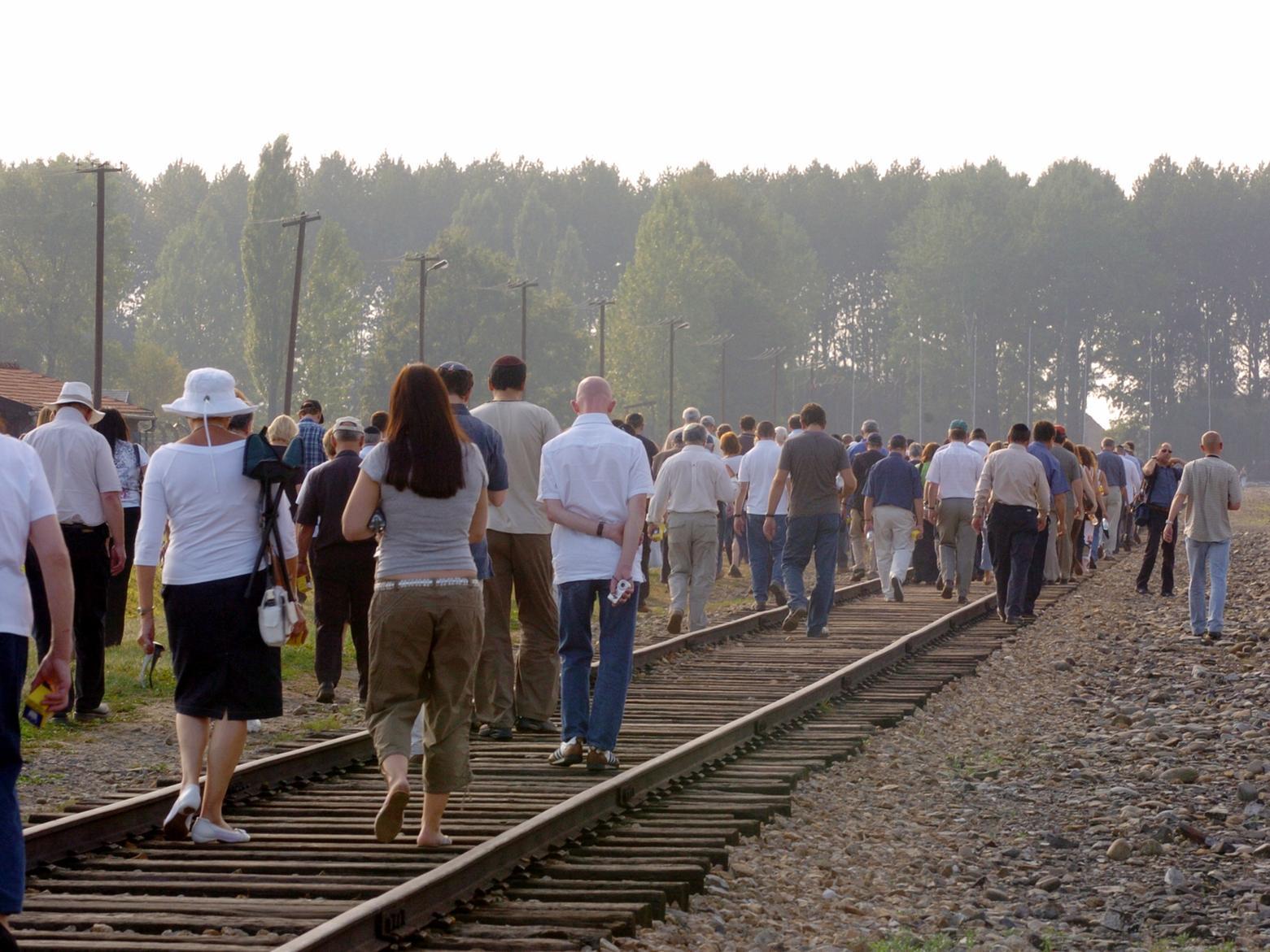 The group follow the railway line into Auschwitz-Birkenau following the same route as the prisoners-only this time by foot.