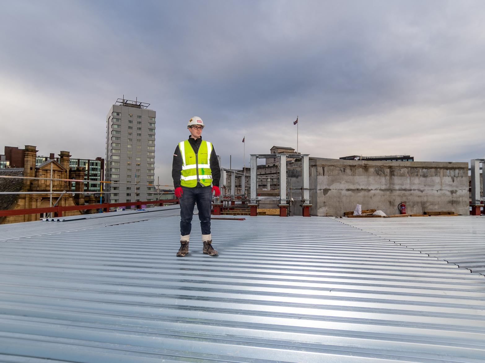 Pictured Eddy Bryan, Graduate engineer for Sir Robert McAlpine looking at the construction progress to date.