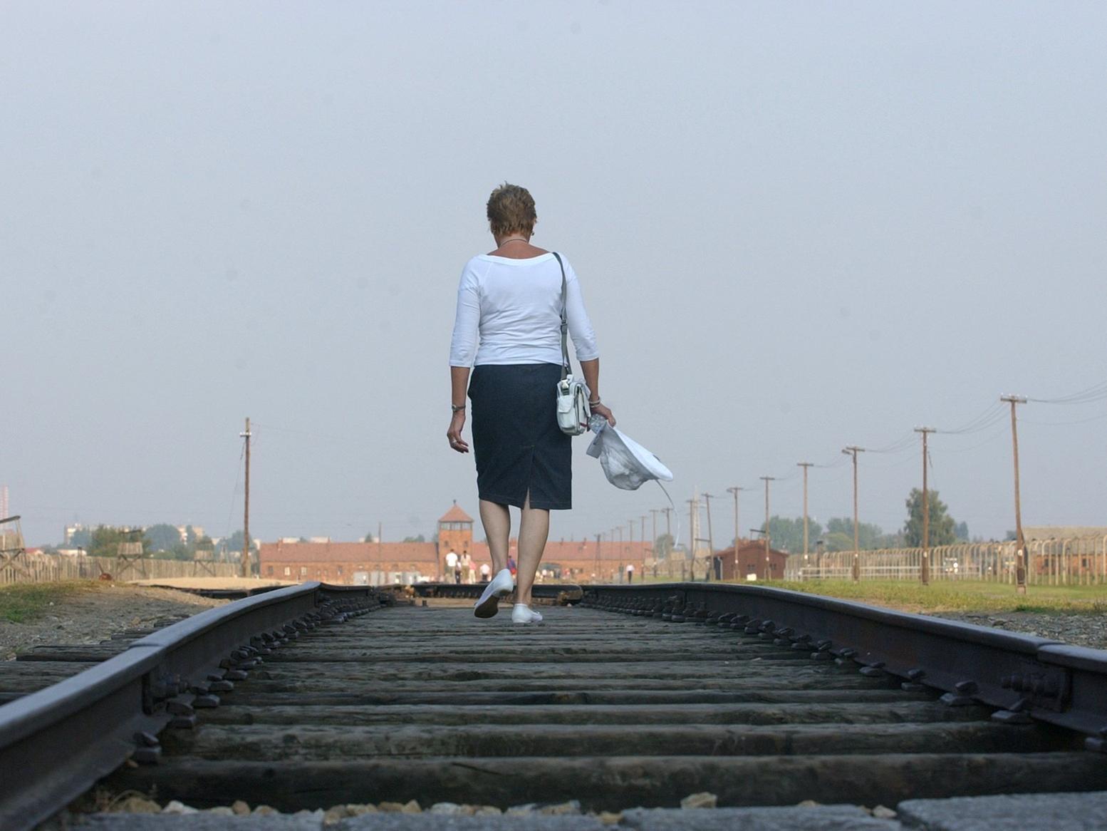 Henriette Lee walks back down the railway line - a walk never completed by her grandparents.