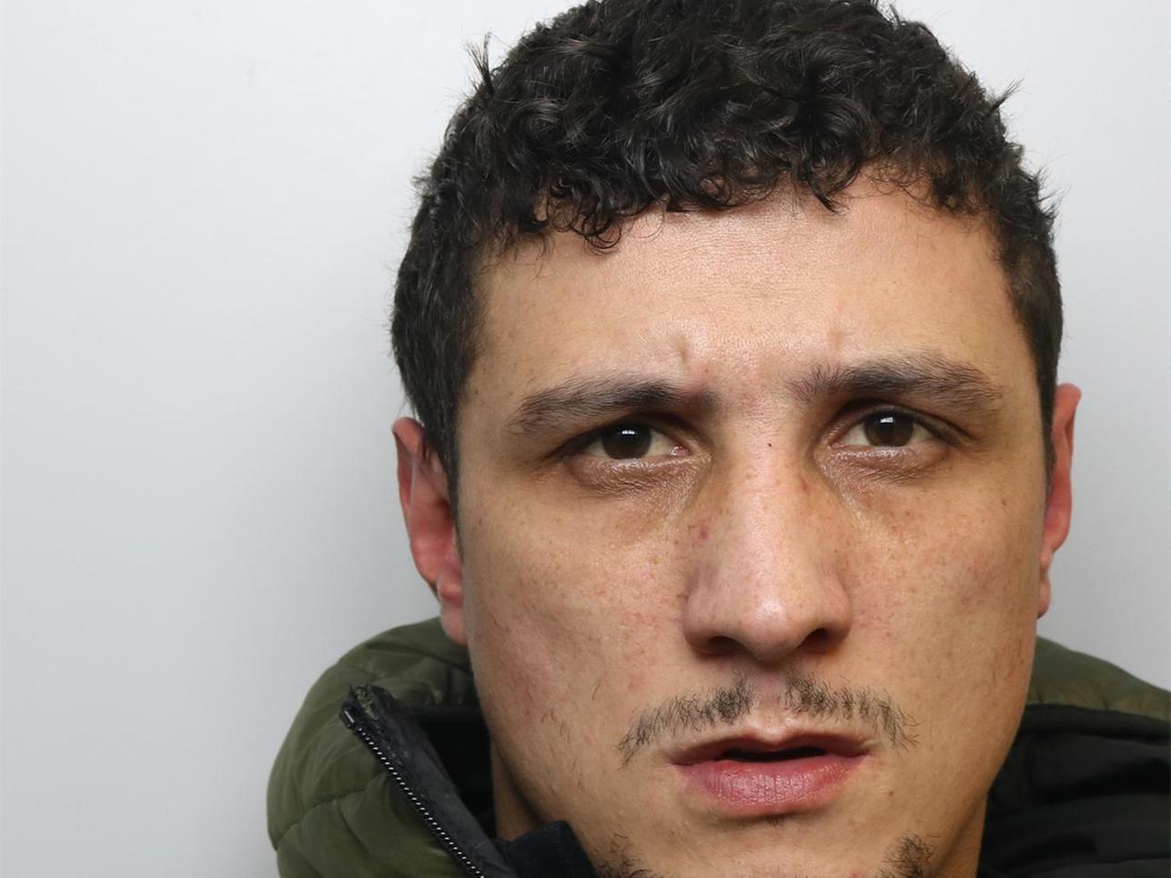 Andrew Semeniuk was arrested outside his former partner's home in possession of a Zombie knife and a Rambo knife