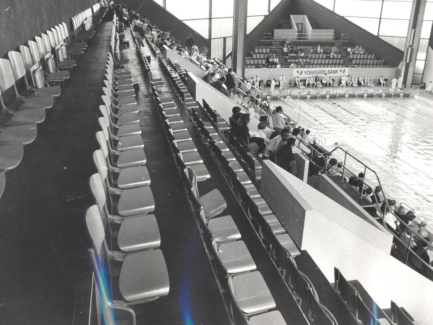 Rows of empty seats during the European Youth Swimming Championships.