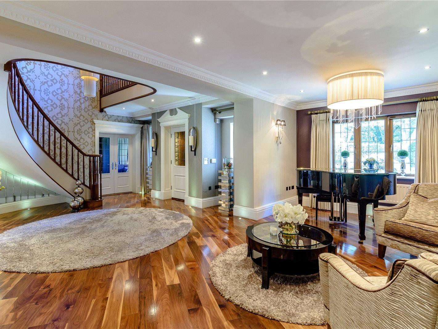 The hallway provides an impressive welcome, and is overlooked by a galleried landing.