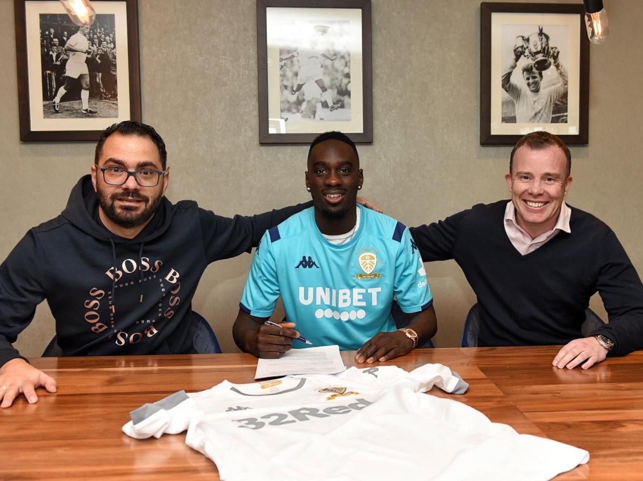 Leeds United loanee Jean-Kevin Augustin signs at Elland Road. (Pic: LUFC)