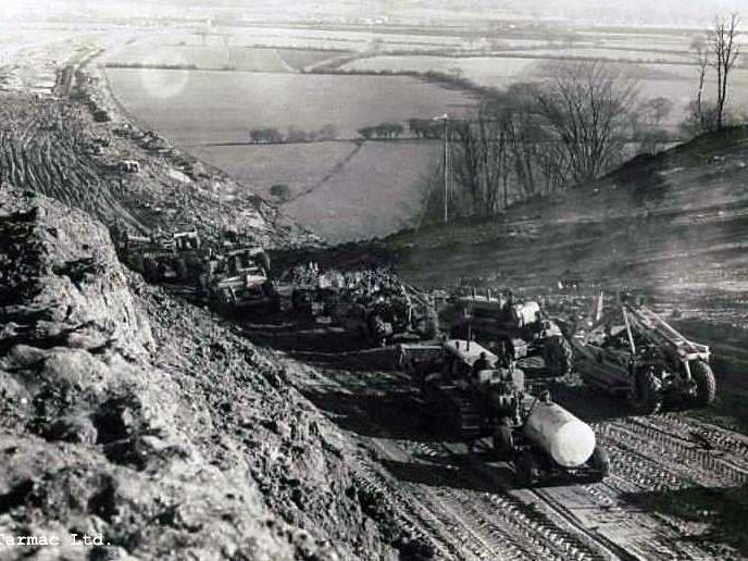 Preston By-Pass 1957 - A posed photograph showing the machinery in use working on the Red Scar escarpment North of the Ribble.