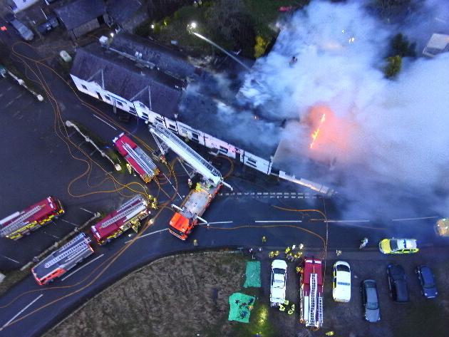 Pictures taken by Lancashire Fire and Rescue Services drone operator, Chris Rainford, show the roof of the building engulfed in flames. 
Copyright: Chris Rainford