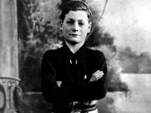 Who could this young chap be? This picture was taken 1933, making the young footballer aged around 11.