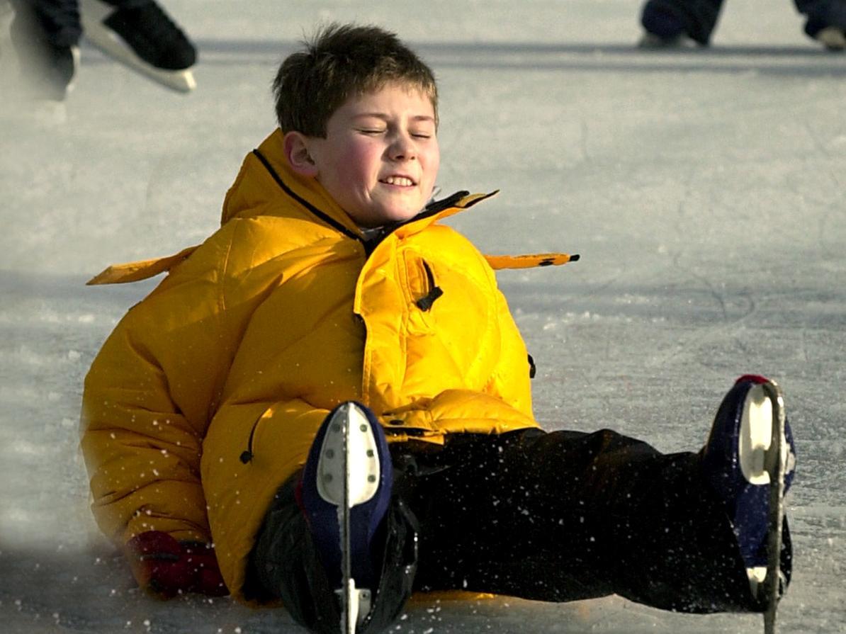 Ten-year-old Miles Harris from Alwoodley takes a tumble on the ice.