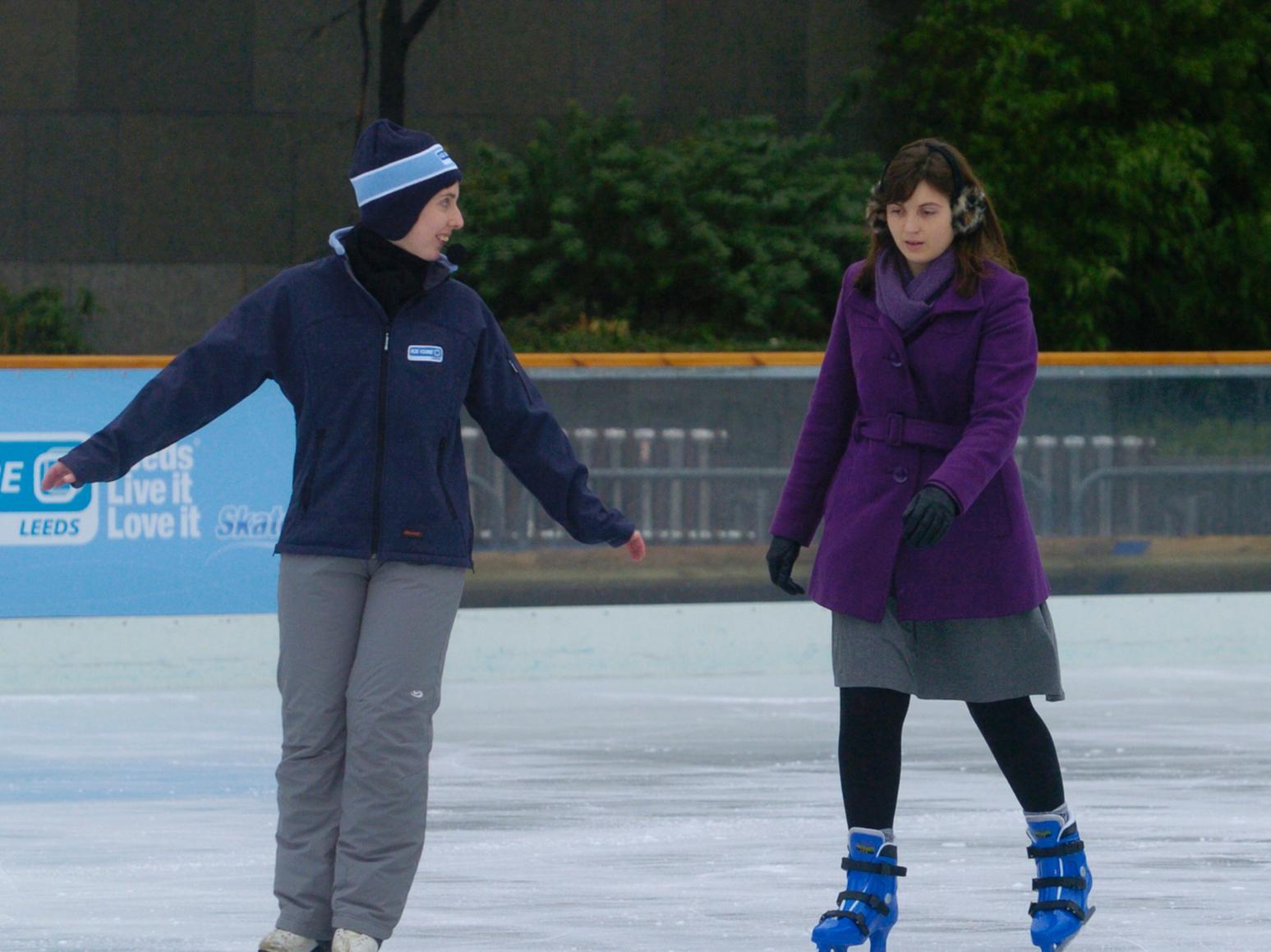 YEP reporter Katie Baldwin learning how to ice skate with instructor Helen Watson.