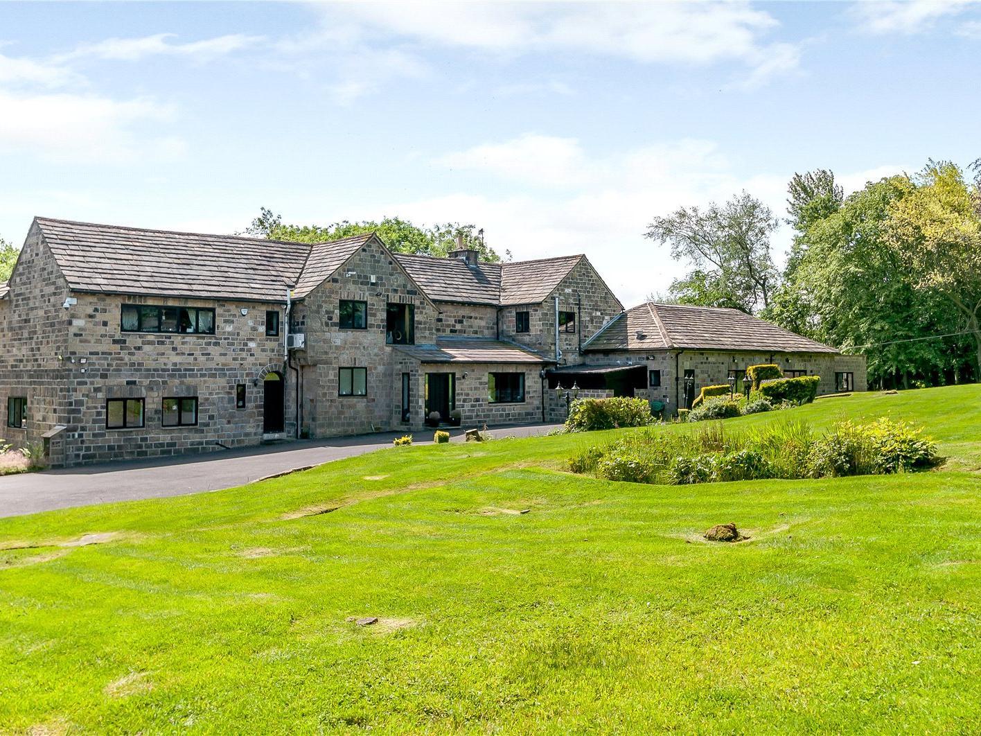 This property, named Moor Grange, is set in an elevated position along Scotland Lane, situated in grounds of approximately two and a half acres