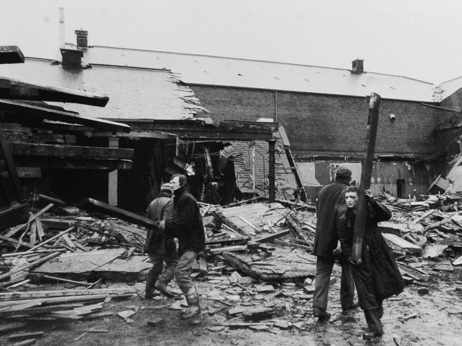 Workmen remove the remains of the ballroom of the Capitol at Meanwood in January 1980.
