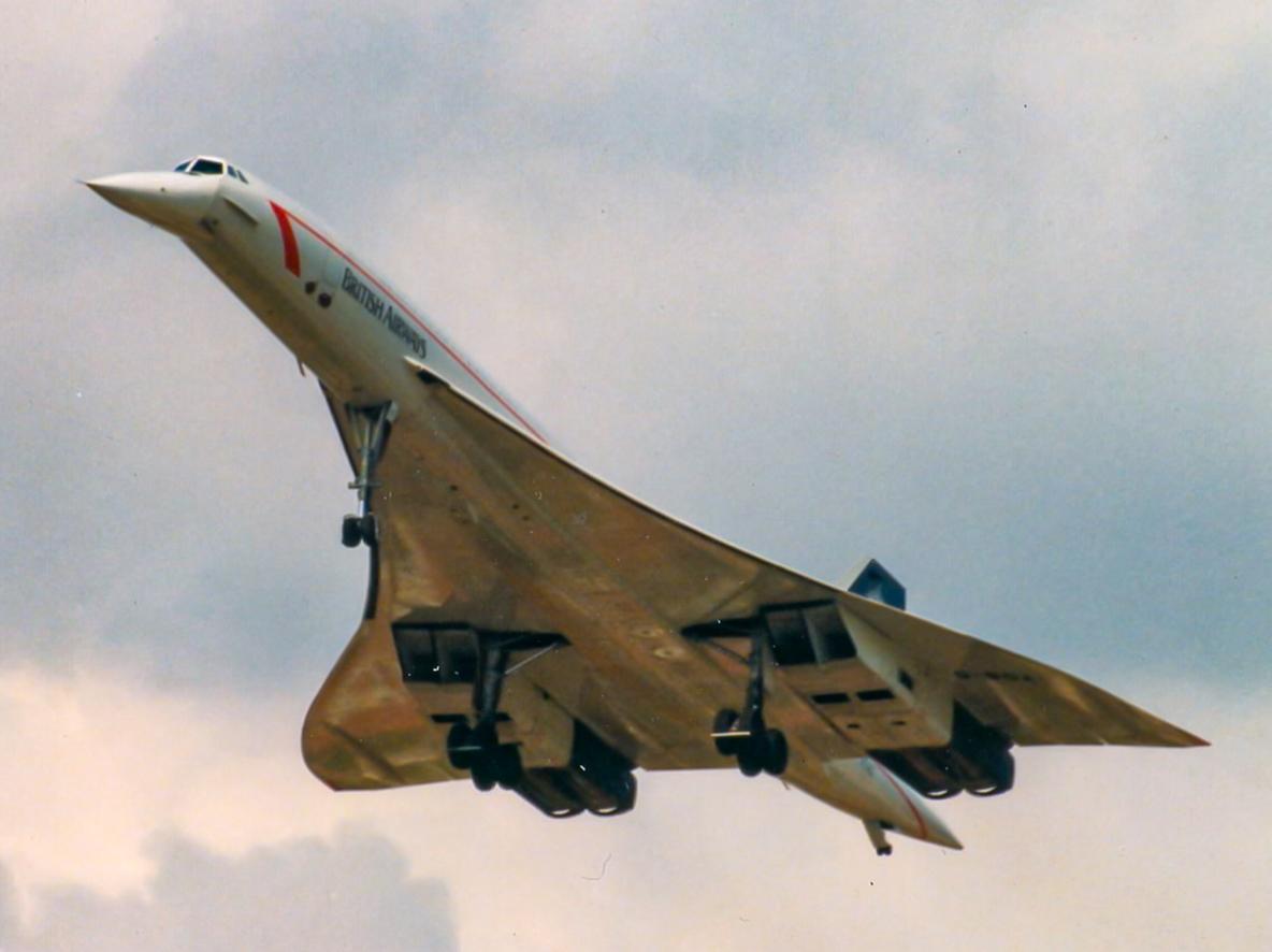 Concorde departing runway 32 in June 1996. This photo was taken from what is known as the cemetery end.