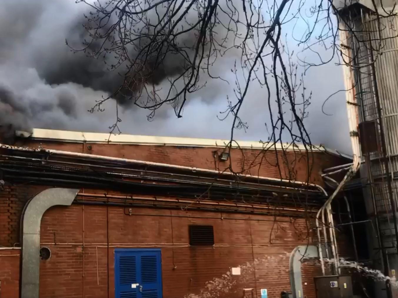 This still, taken from a video by David Bodden, shows fire crews tackling the blaze at the factory.