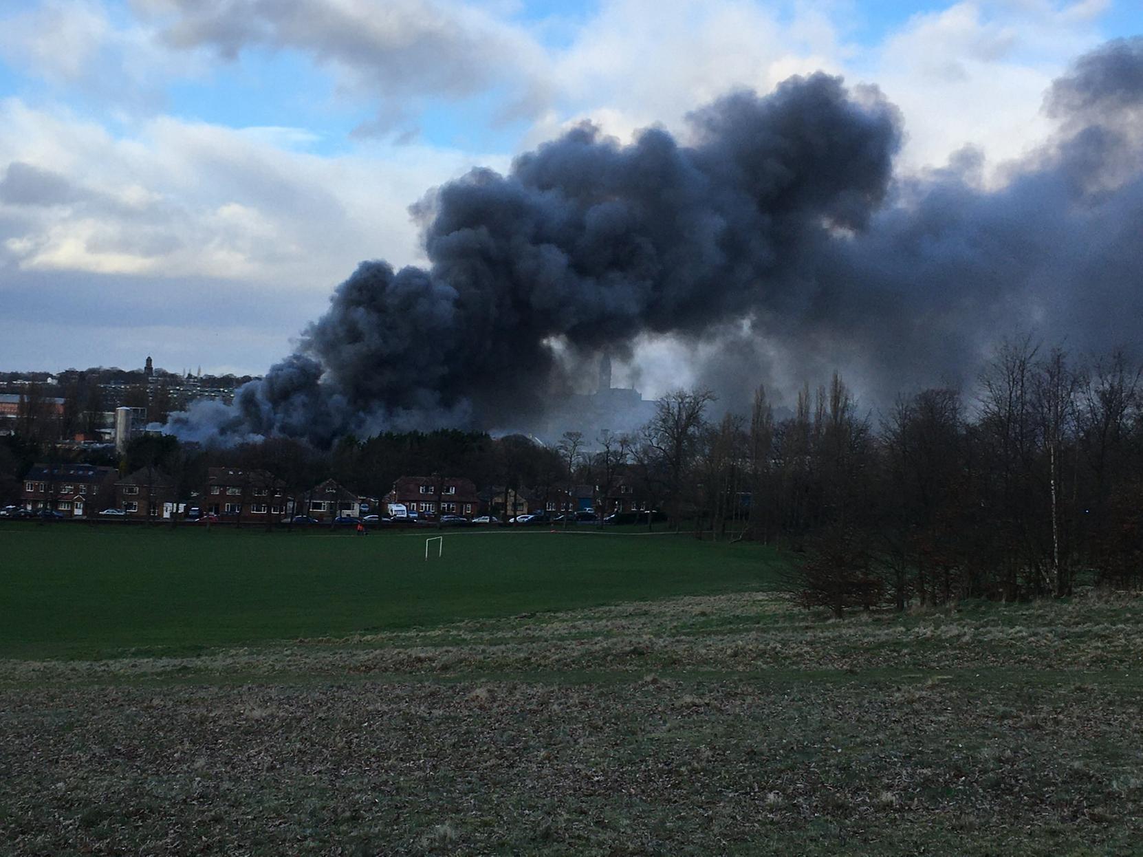 Another shot, captured in Thornes Park, shows smoke rising above the city.