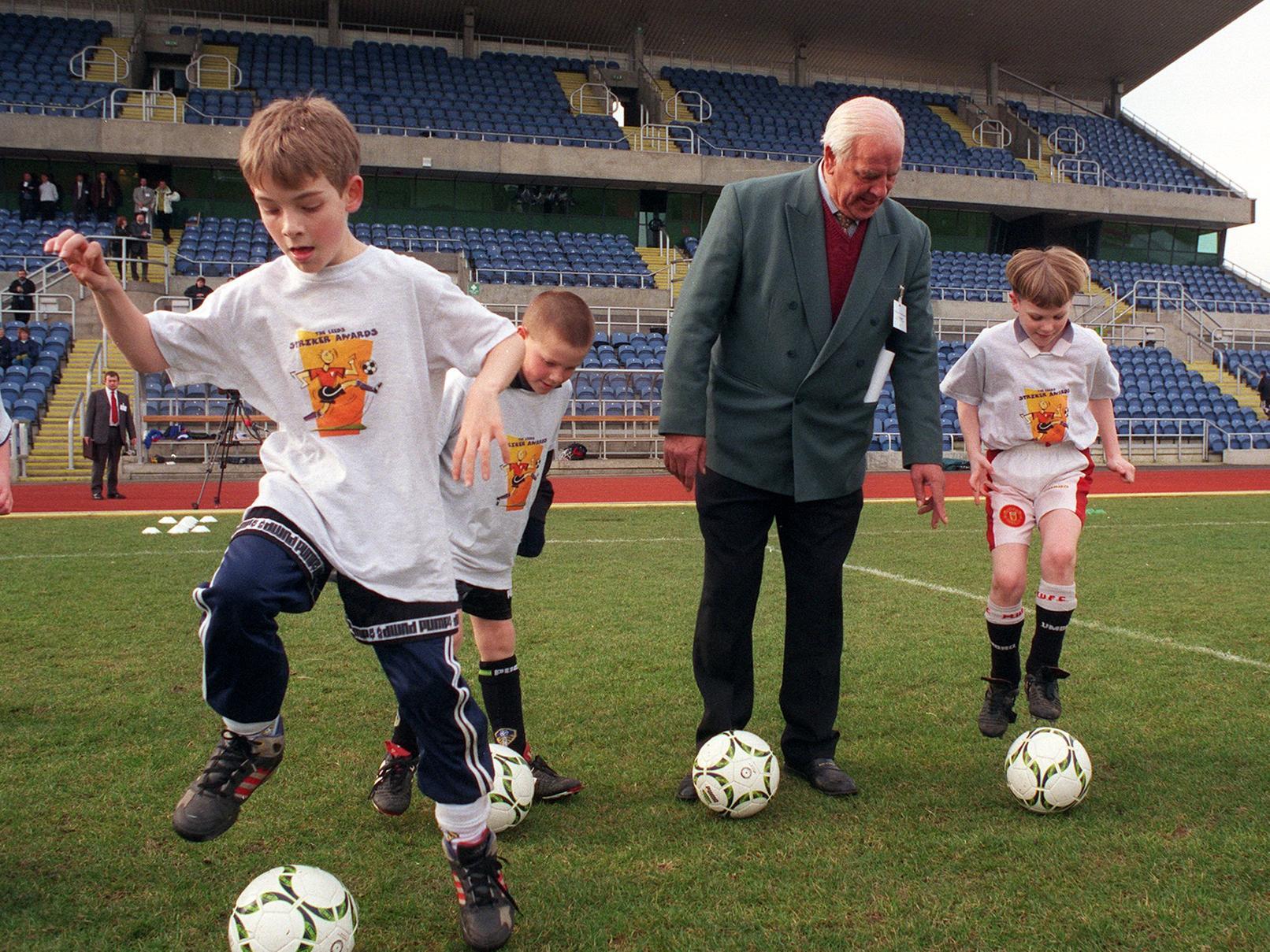 Leeds United legend John Charles was at South Leeds Stadium to give tips to these football-mad youngsters.