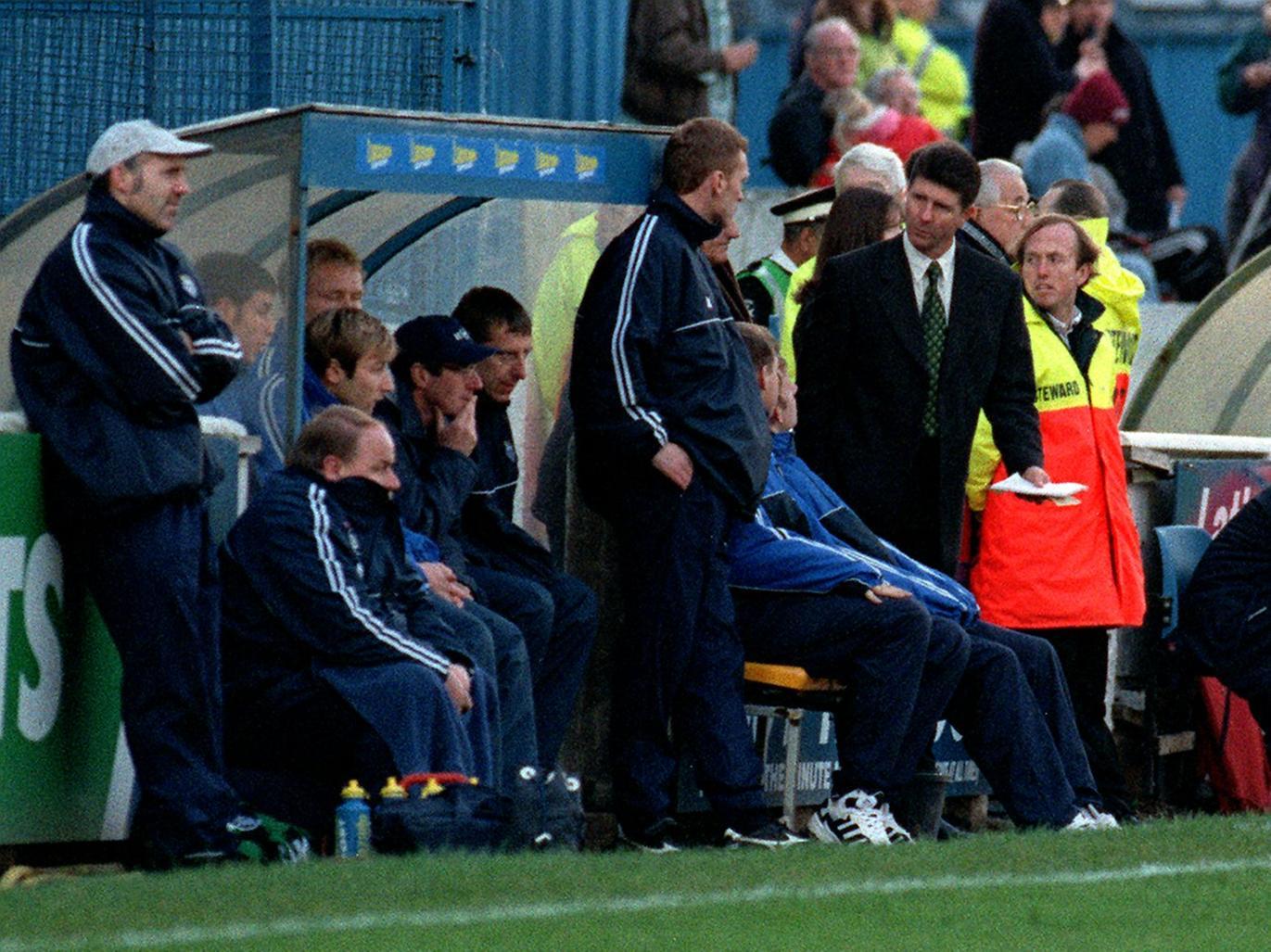 PNE manager Gary Peters talks to assistant David Moyes, while physio Mick Rathbone has a standing view from the dug out at Springfield Park in 1997