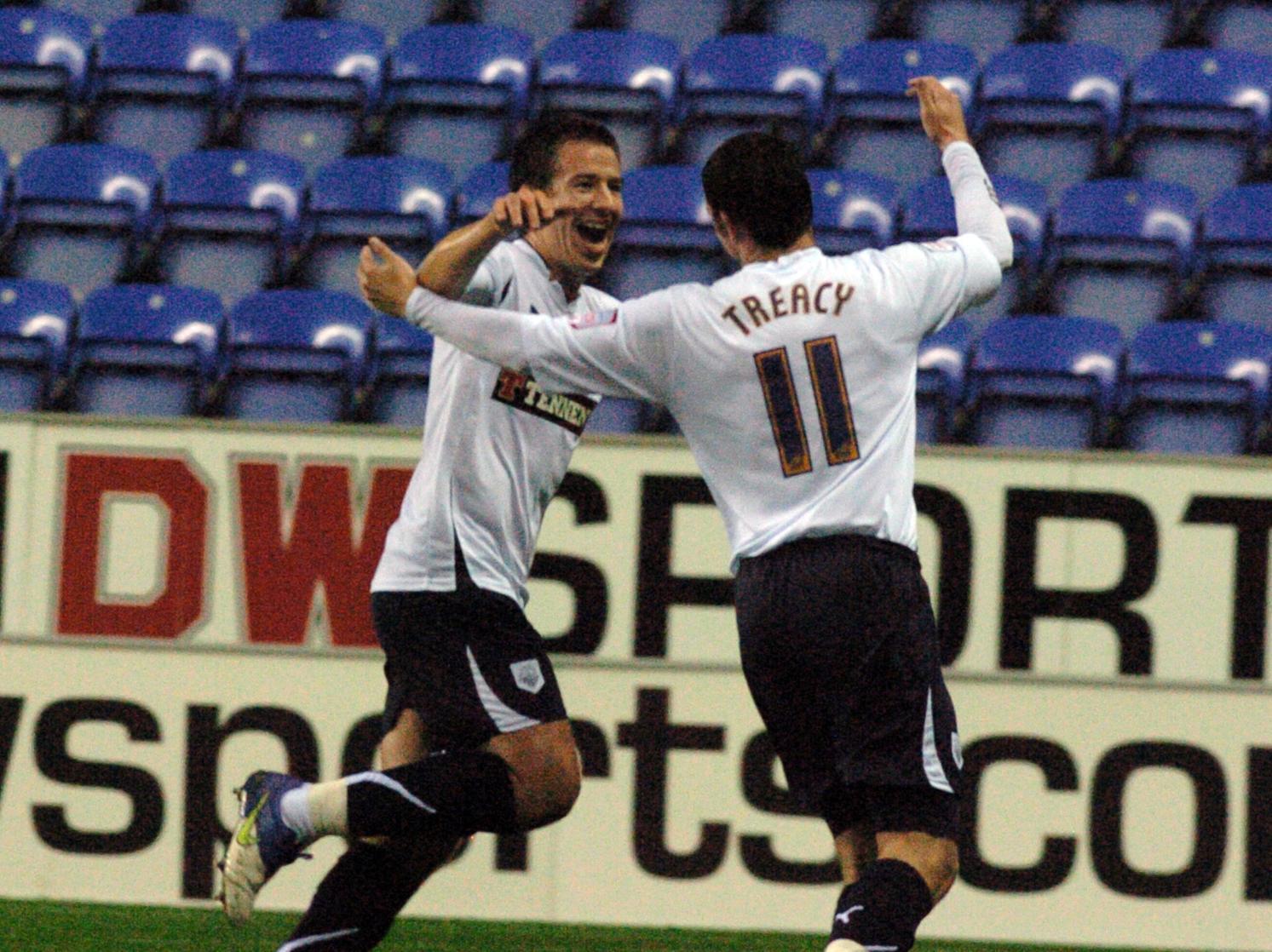 Keith Tracey celebrates with Sean St Ledger after scoring for PNE at Wigan in the Carling Cup in September 2010 - Wigan hit back to win the game 2-1