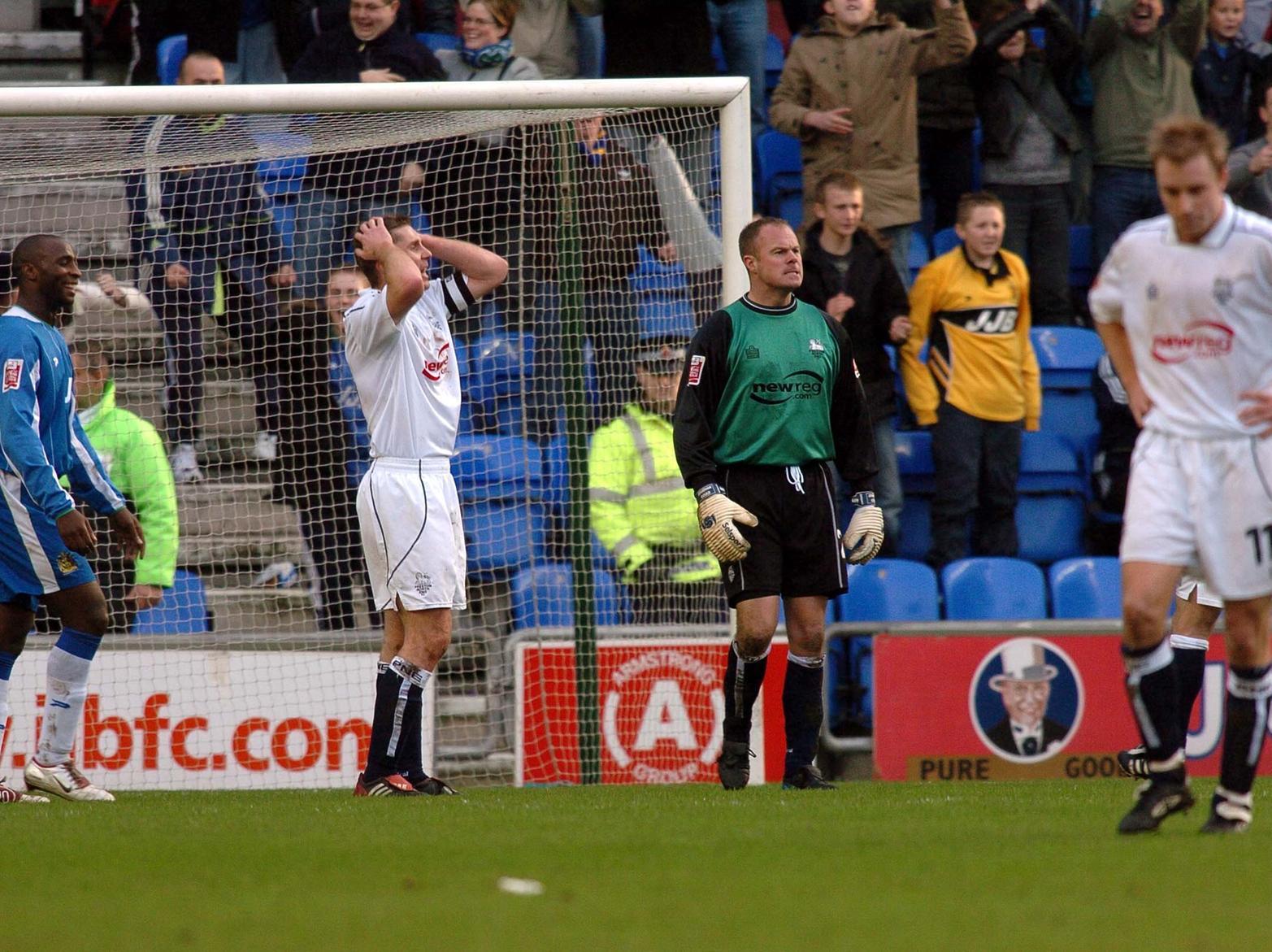 PNE were beaten 5-0 at Wigan in December 2004 and the anguish shows on the face of North End keeper Jonathan Gould