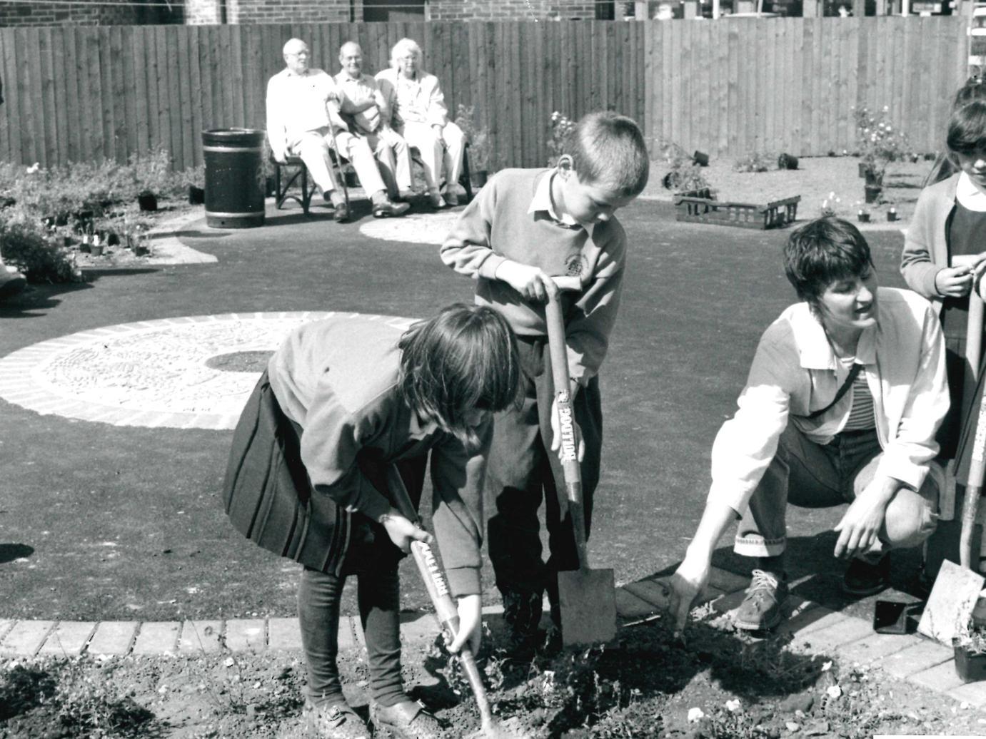 Greenhill Infants School pupils plant a new garden, 1995.