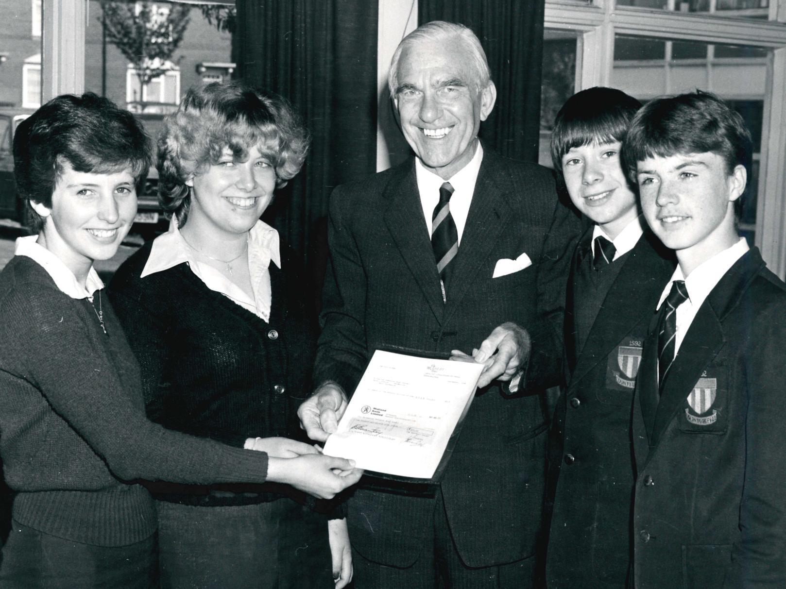 Freeston High School, a cheque is handed over by the adjudicator of the SPAN project, 1980.
