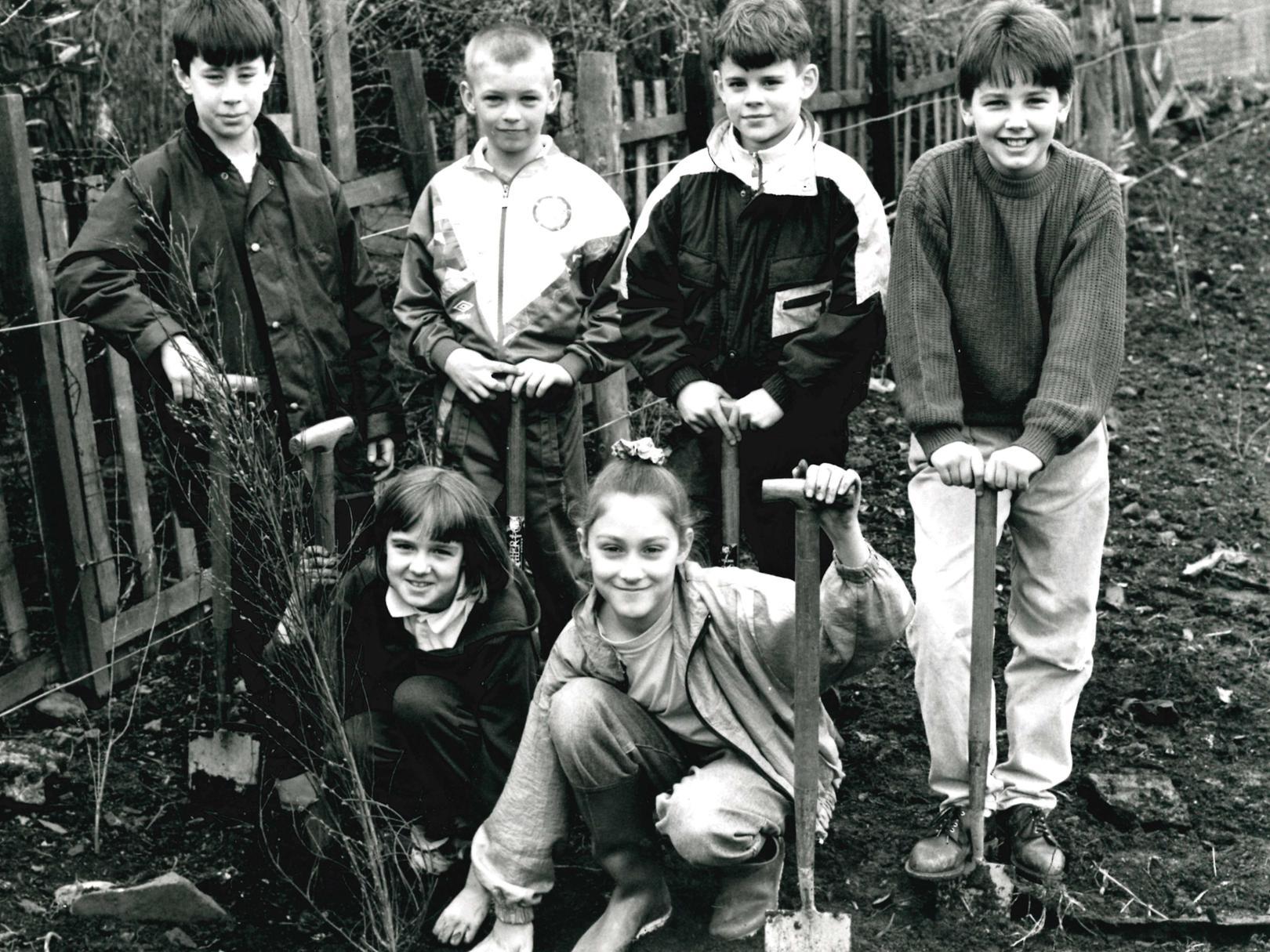 Outwood Junior & Infants School pupils help to create a wildlife garden at Outwood Bowling Club, 1992.