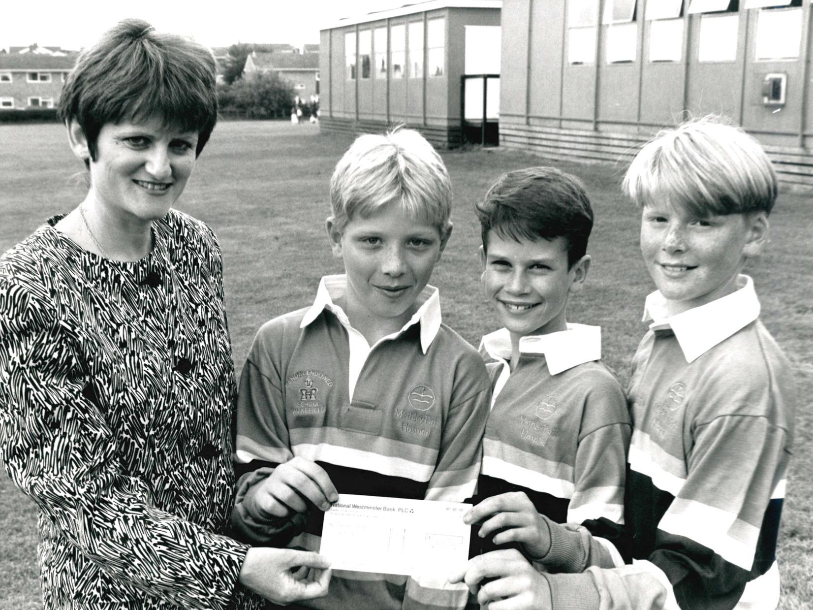 Sandal Endowed School,  rugby strip is presented to the school by Methley Park Hospital, 1983.