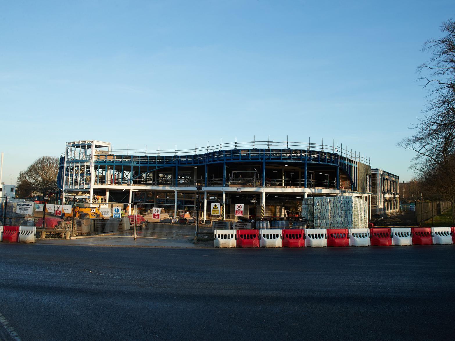 By January 2020, the building had really begun to take shape, with the roof completed and walls in process.