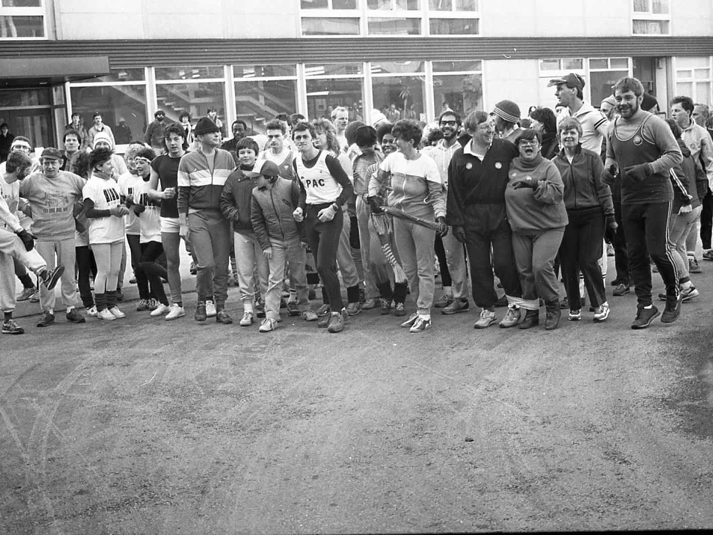 They're off! Fun runners leap into action at Lancashire Polytechnic in aid of the man who fired the starting pistol. Dr Tim Curtis is suffering from leukaemia and an appeal named after him is helping to pay for a new leukaemia unit at Christie's Hospital in Manchester. Around 100 people jogged through the campus at Preston to raise funds