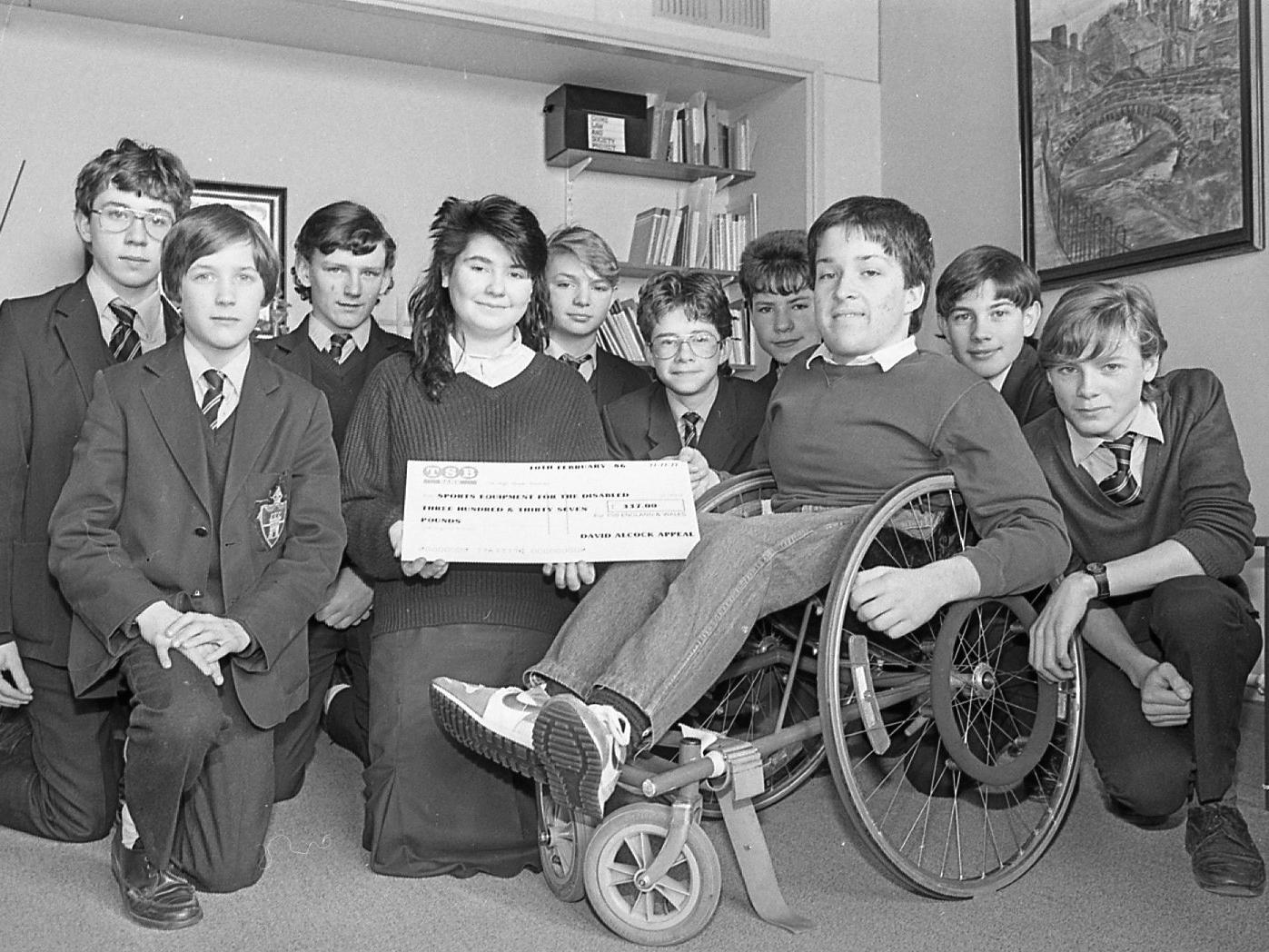 Pupils at Bishop Rawstorne High school at Croston, near Chorley, proved 'good buddies' to disabled sportsman 14-year-old David Alcock when they raised more than 400 in a sponsored CB radio marathon. Nearly 40 people joined a 12-hour non-stop talk-in on Citizen's Band Radio to help David buy a special high-speed wheelchair
