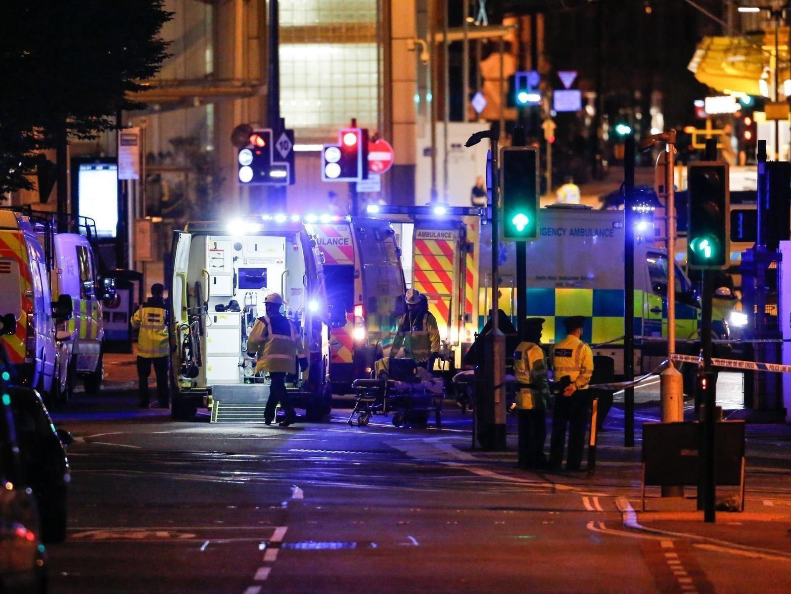 Emergency services at the scene of the Manchester Arena bombing in May 2017. Picture: SWNS