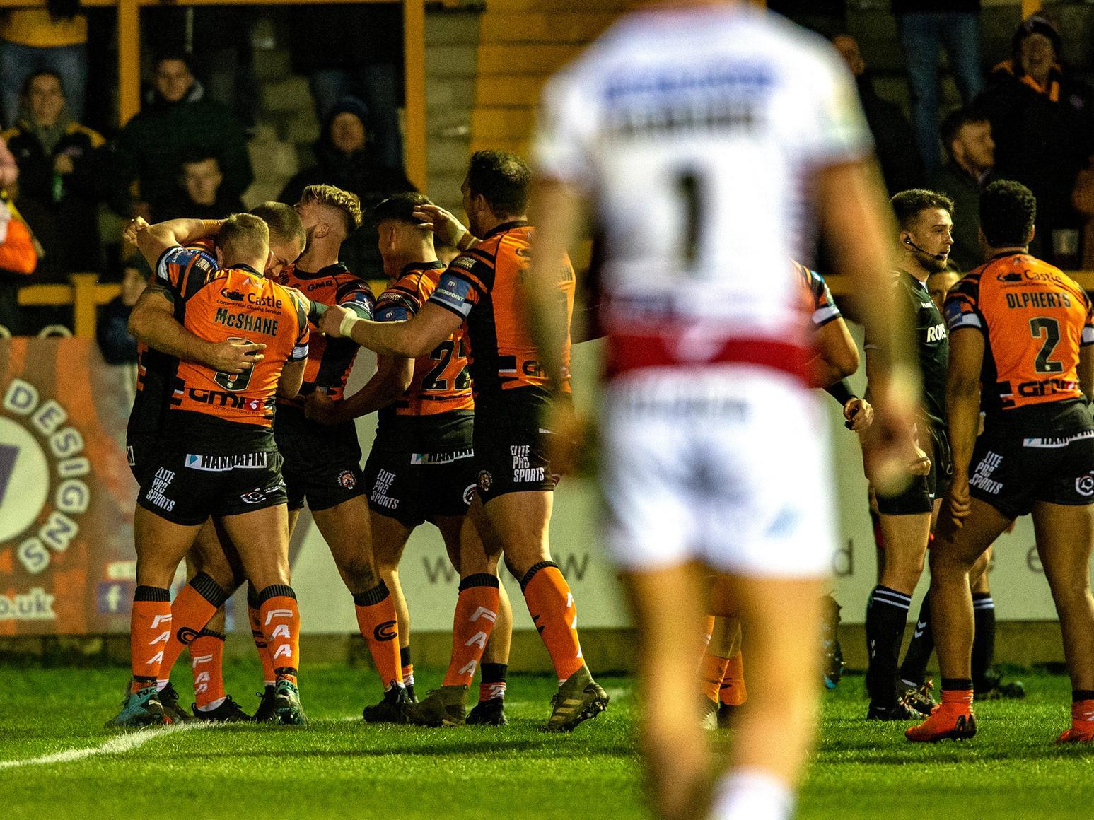 Tigers celebrate against Wigan. Picture by Bruce Rollinson.