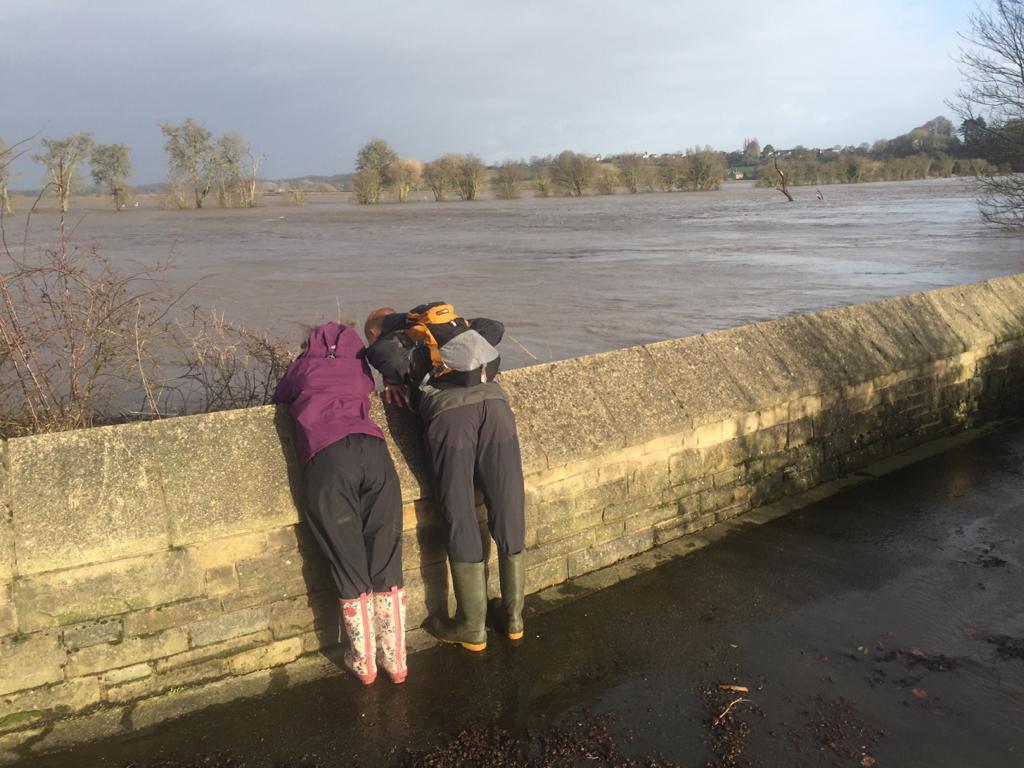 The River Ribble attracting the attention of passersby.