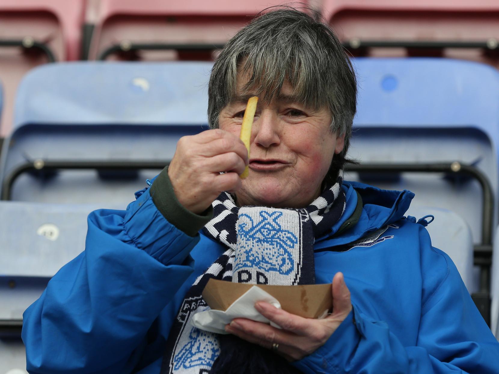 One fan looks pretty satisfied with their food.