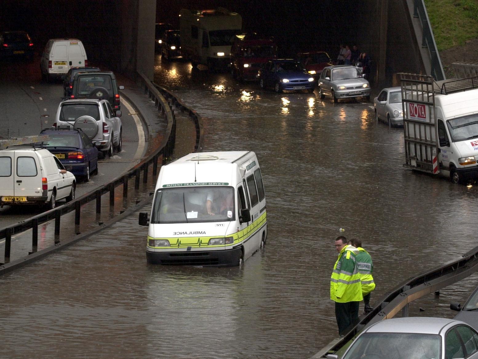 Storms brought chaos to the city just before rush hour. An ambulance driver ponders how to help a stramnded colleague and patients on the Leeds Inner Ring Road.