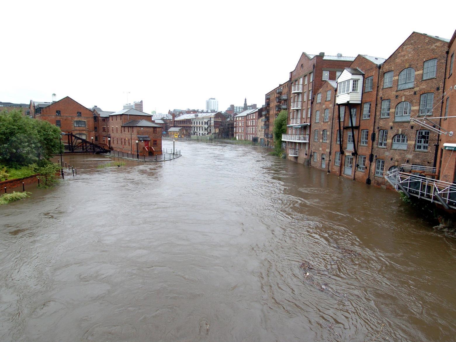 The flooded River Aire in the city centre.