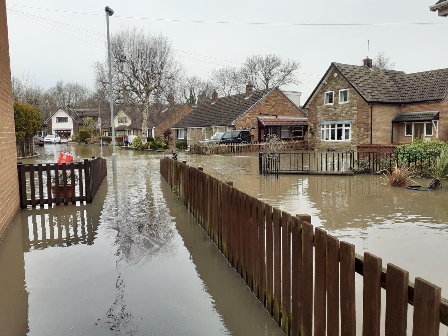 Residents of Reid Park Avenue were stranded at home today after the River Calder burst its banks in Horbury Bridge.