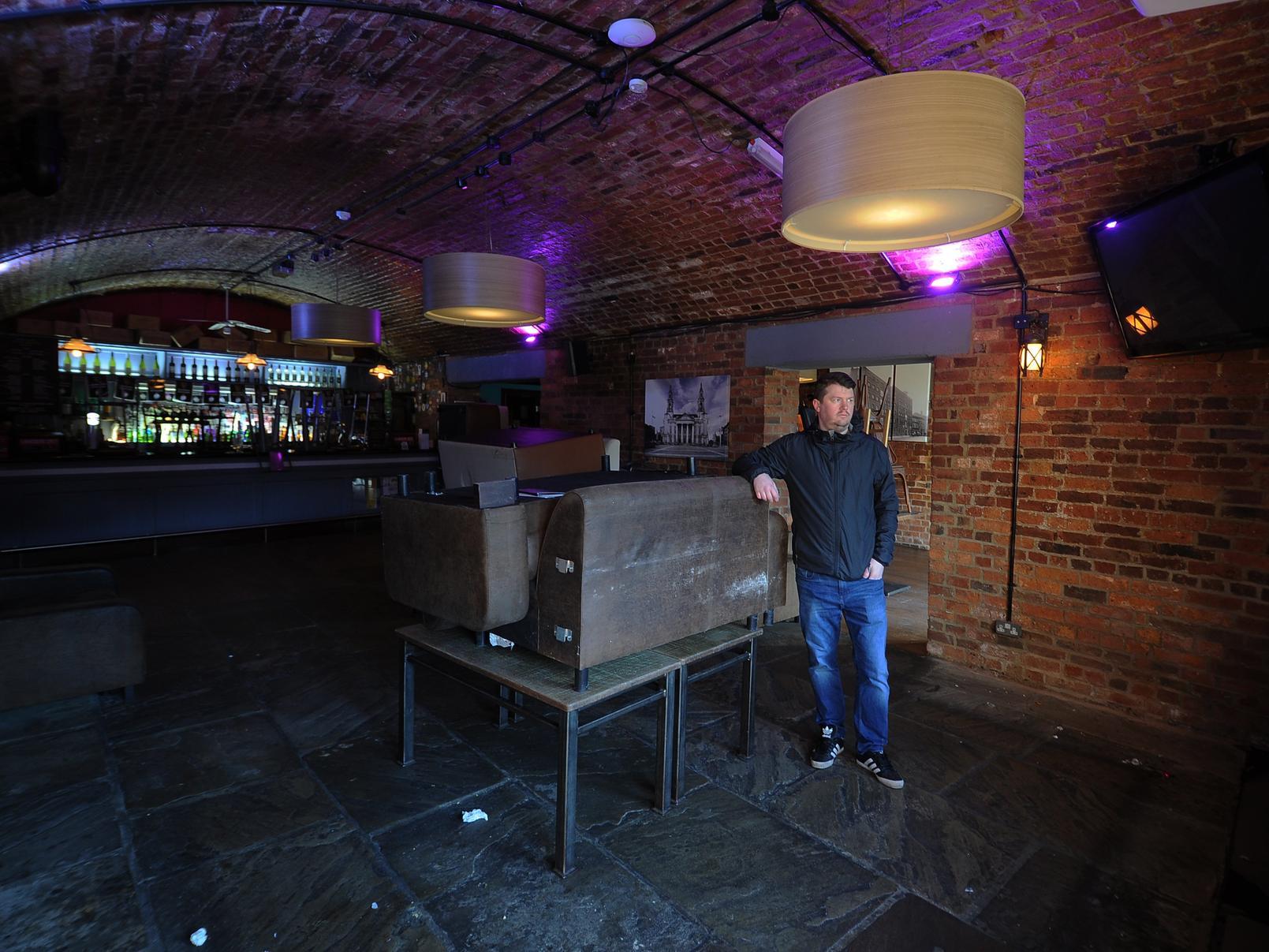 Colin Deakin inside Aire Bar, where staff spent the morning clearing up after the latest flooding. Picture: Simon Hulme