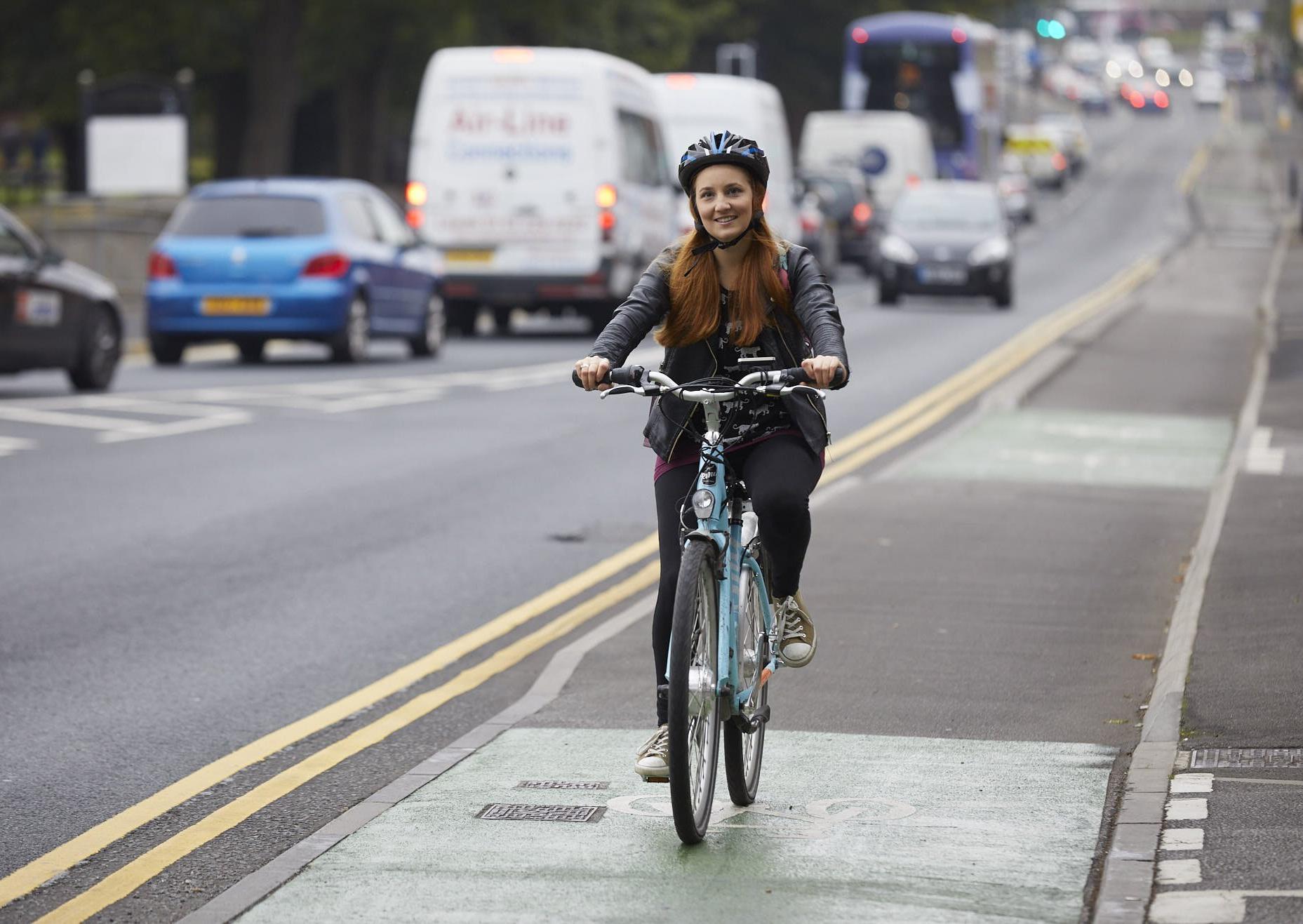 A cyclist beats the traffic in Armley on the 23km-long  Bradford to Leeds Cycle Superhighway. Picture: John Hutchinson