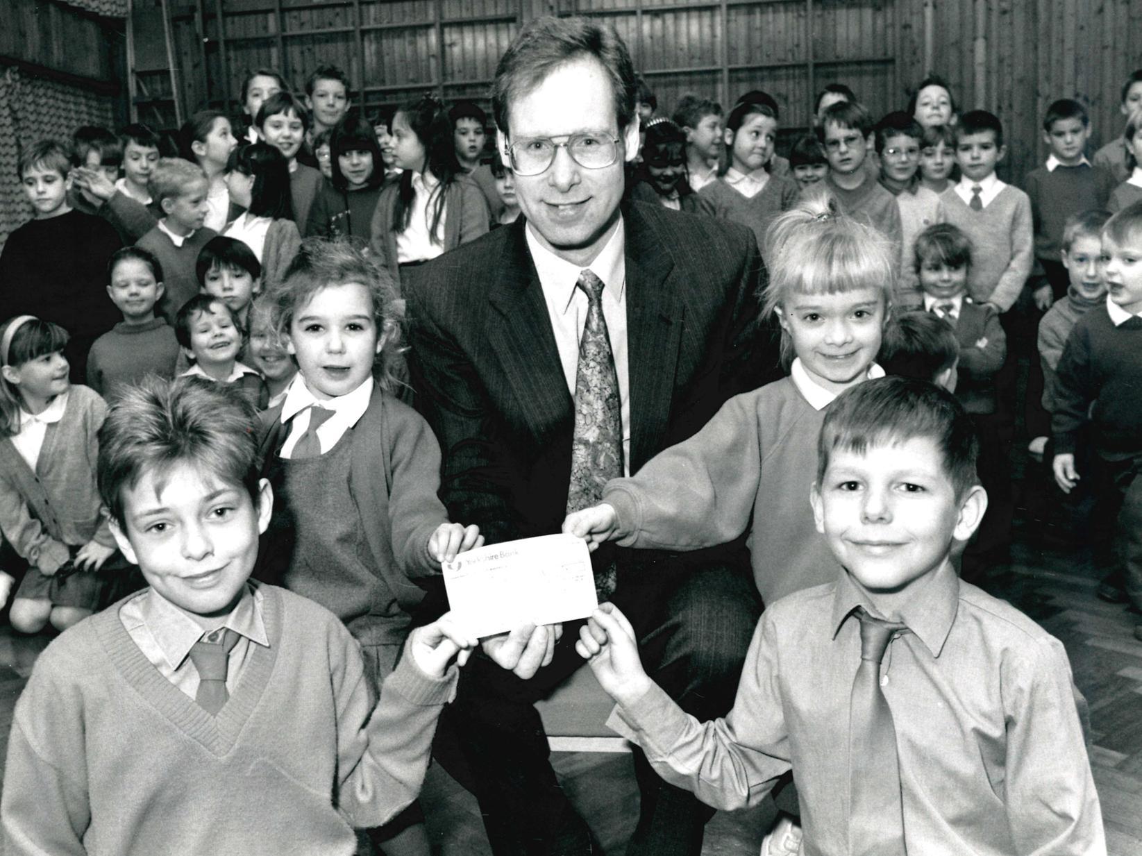 Kirkhamgate Junior and Infants School, presentation of cheque for childrens cancer fund, 1992.