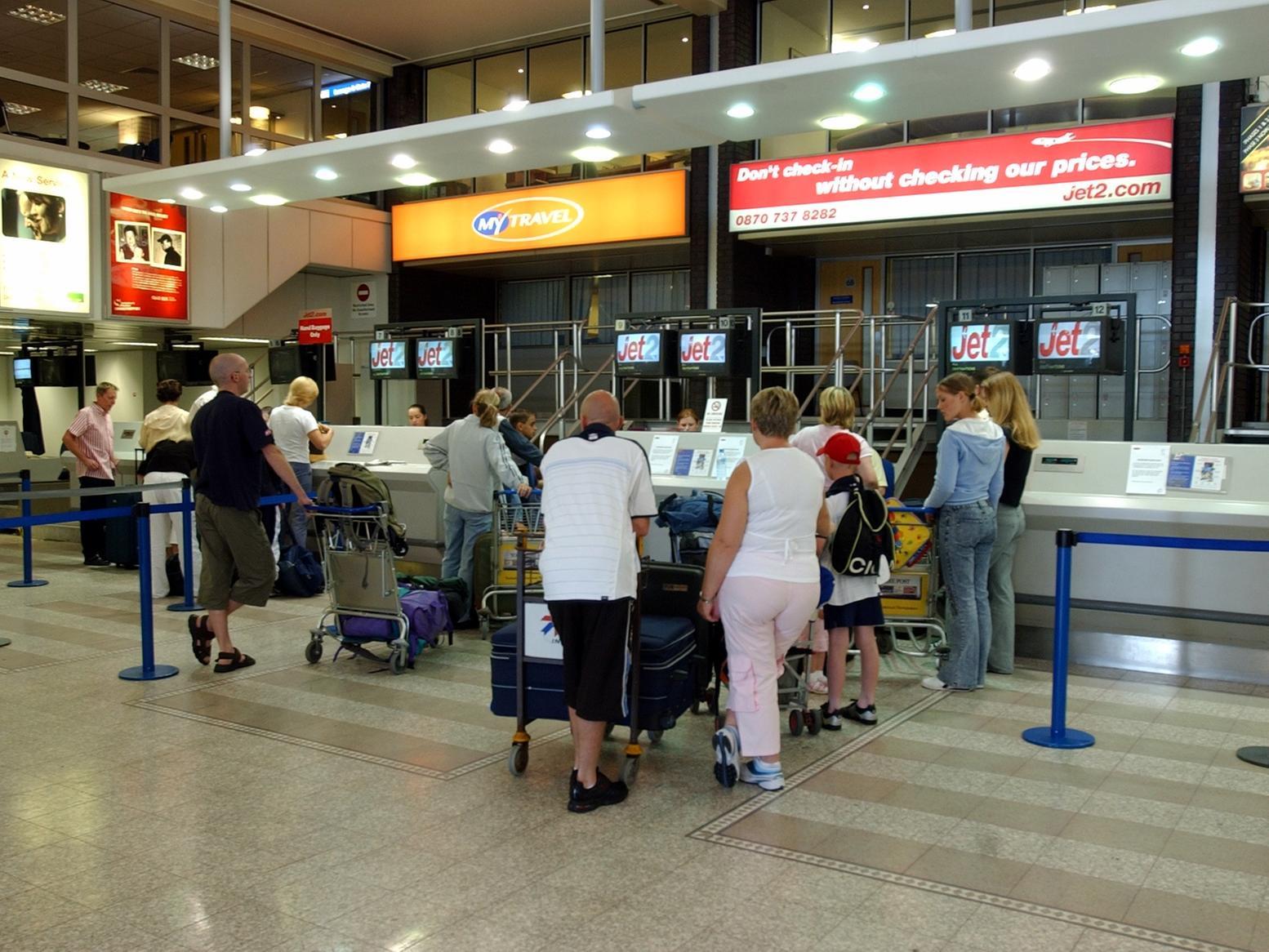 Passengers at the check in desks. Would you have been among them back in the summer of 2003?