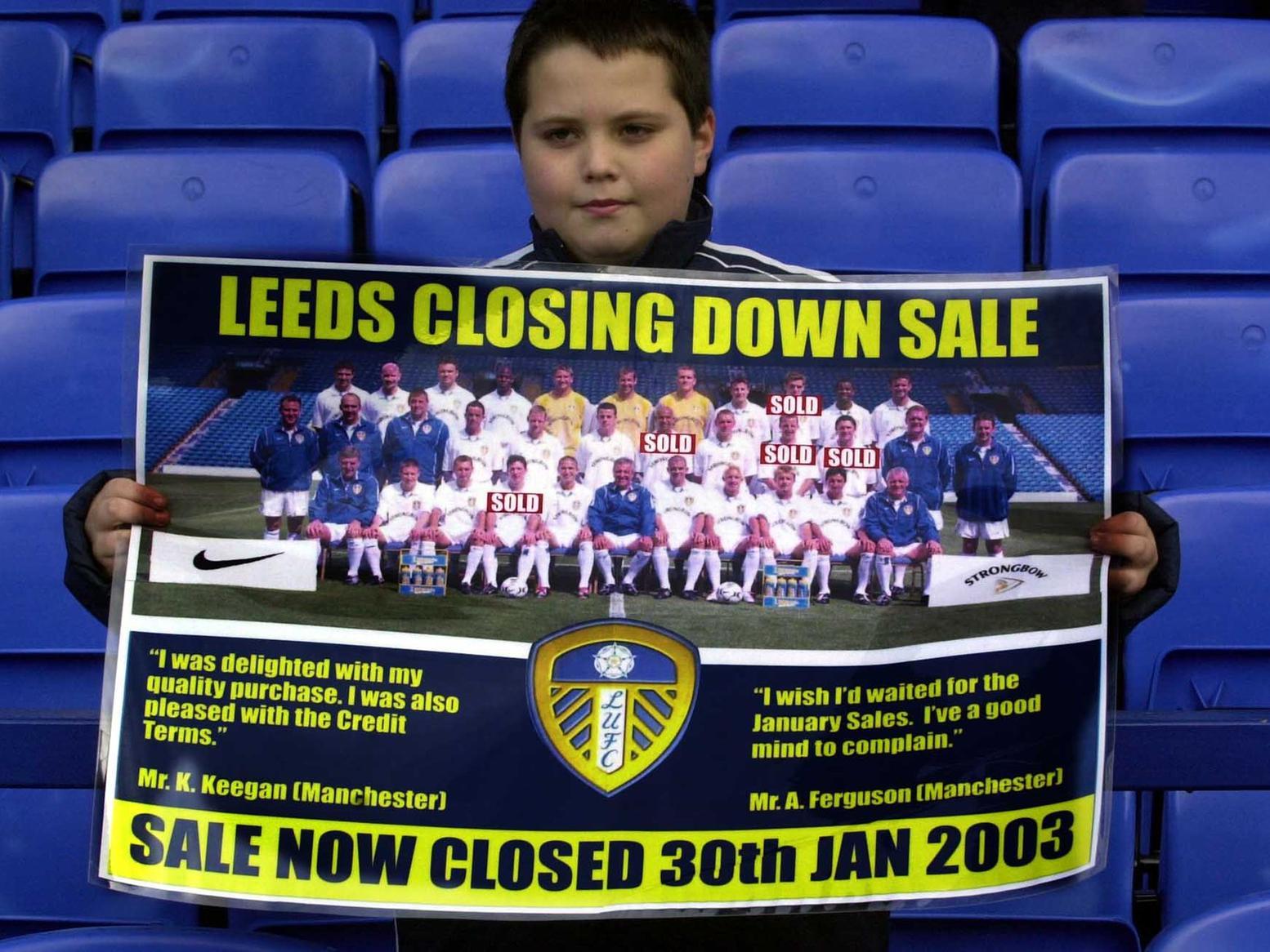 The Elland Road faithful were restless. This is young Nick Sharples pictured ahead of Leeds United's clash with Everton at Goodison Park, with a poster his dad made for him.