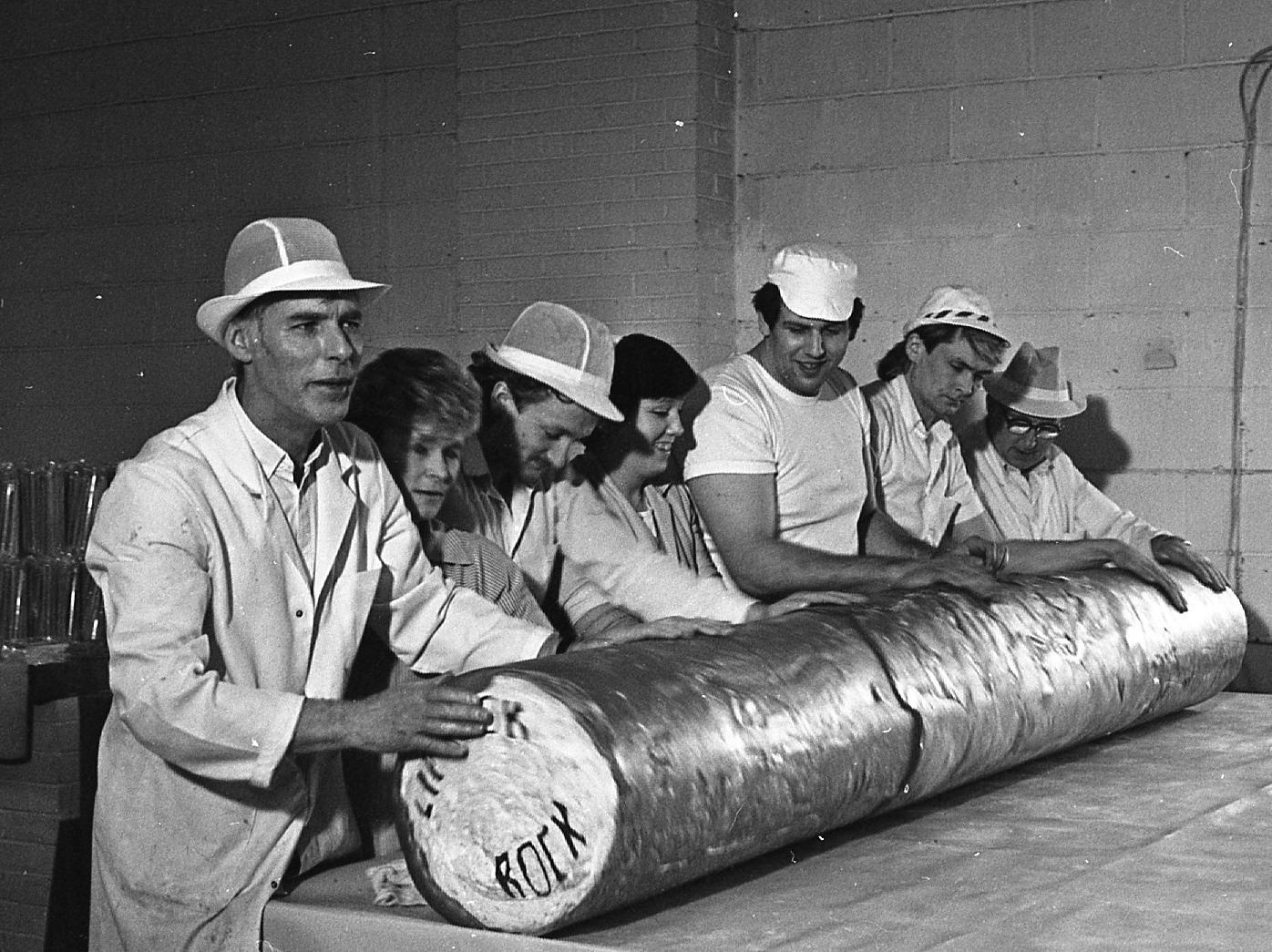 This giant stick of candy is a rock solid record. The 500lb monster is set to enter the Guinness Book of Records as the largest rock around. Nine feet, two inches long and 14 1/2 inches thick, the rock rolled off the production line at Blackpool's Fylde Confectionery Company after a marathon cooling session. The rock will help raise cash for the Children in Need appeal in the summer