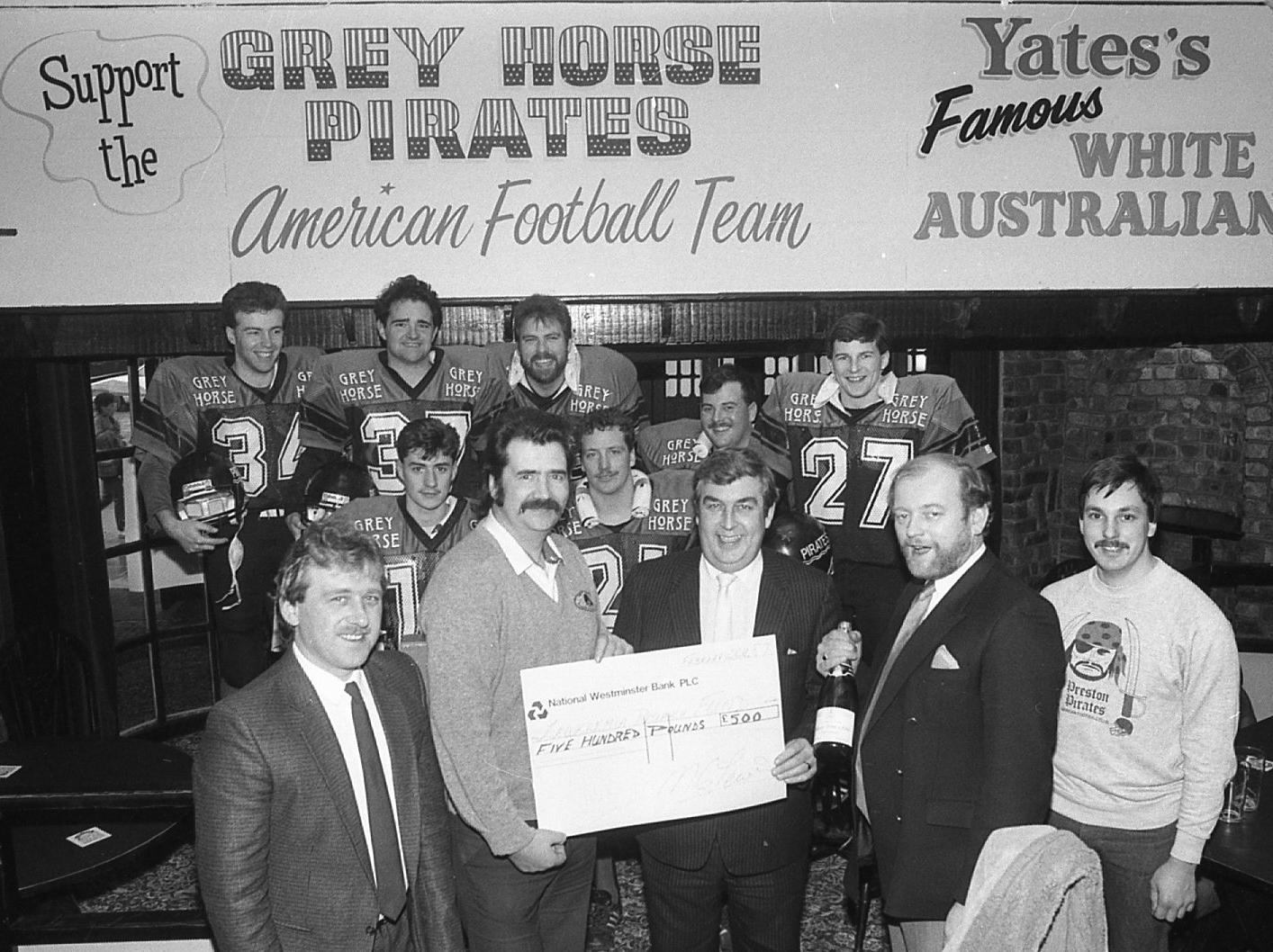 A cheque for 500 has been presented by the Preston Pirates American Football Club to Yates Brothers Ltd to aid leukaemia research. The Pirates, who are sponsored by the Manchester-based company's Preston Grey Horse pub, raised the money when their biggest players pulled a 32-ton truck on a 10-mile tug around the town