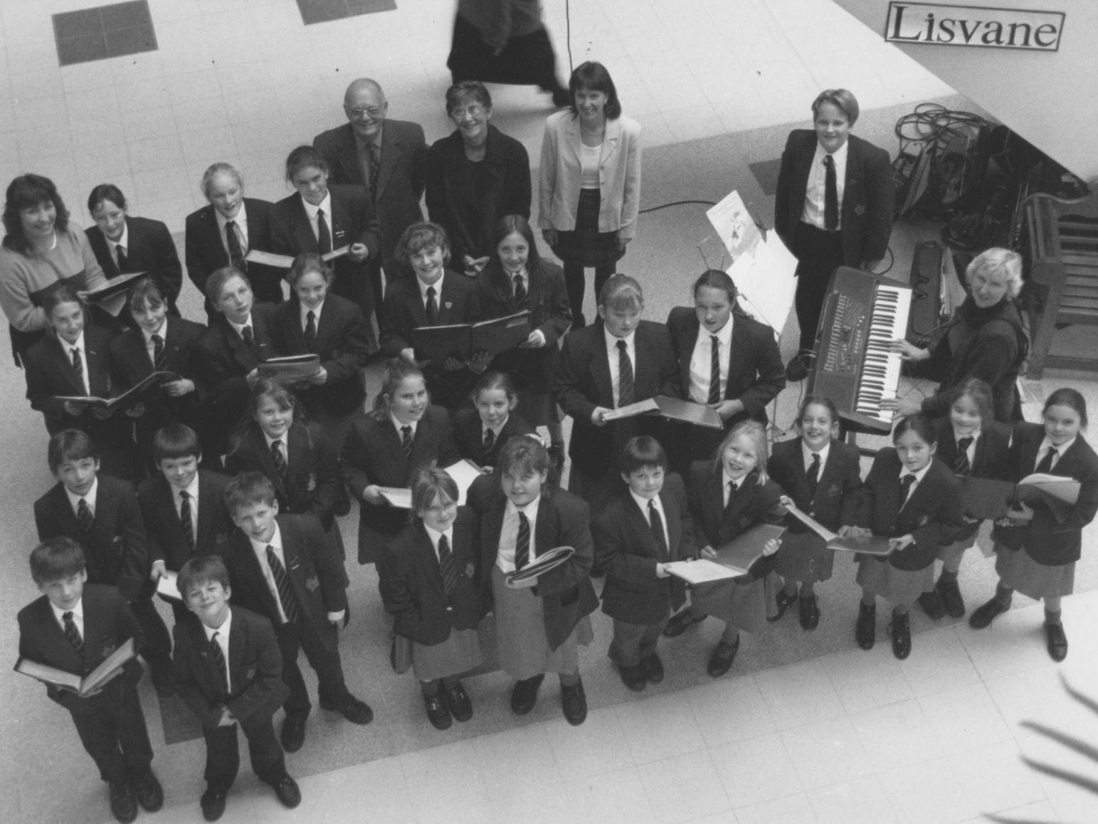 Lisvane School Choir are pictured in December 1997 with member of staff performing Christmas carols in the Brunswick Centre for the passing shoppers.