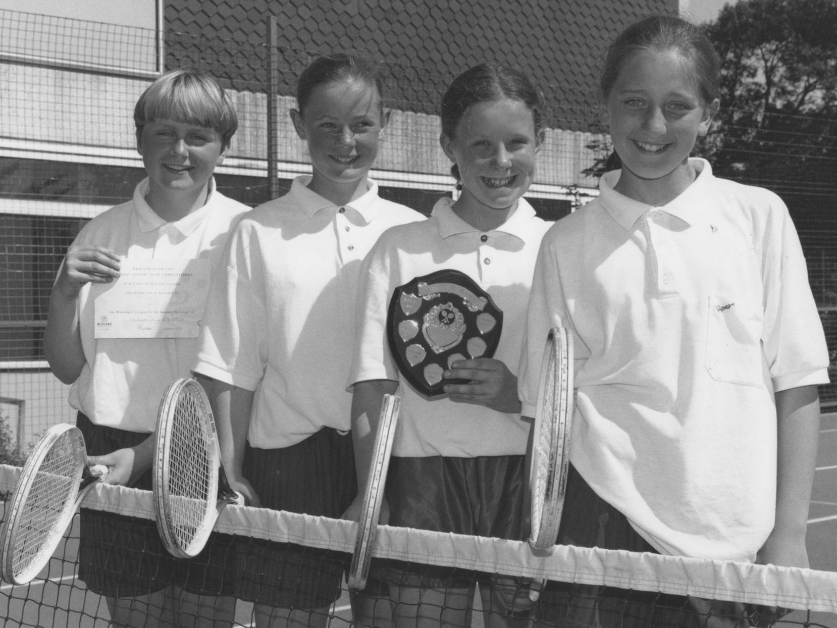 The victorious Scalby School under 13s tennis team won this tournament shield in June 1995. Pictured, left to right, Fay Evans, Sally Walsh, Lauren Moss and Lucy Clayton. Team member not pictured is Sarah Beeston.
