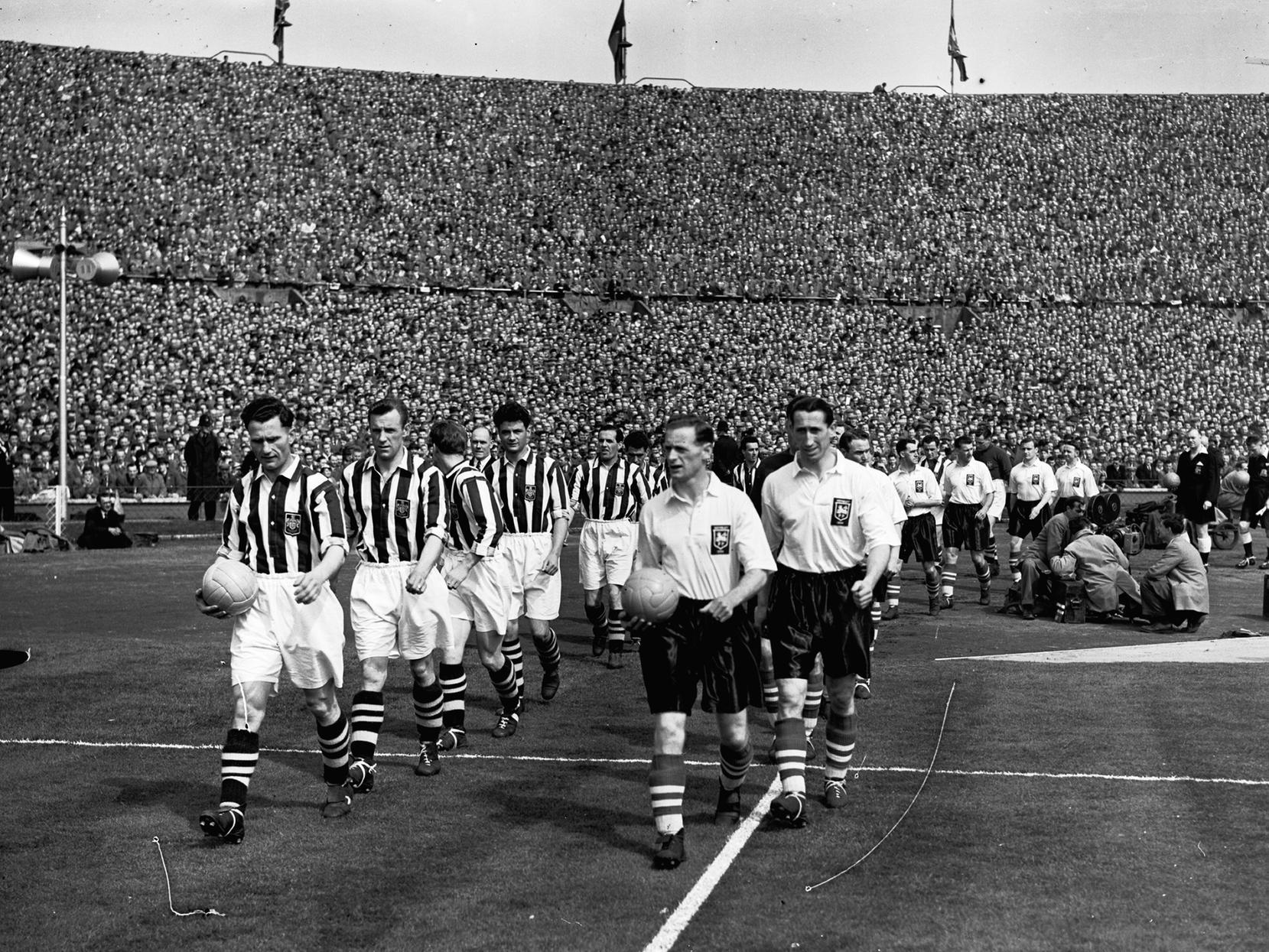 Tom Finney leads Preston North End out at Wembley for the FA Cup Final against West bromwich Albion