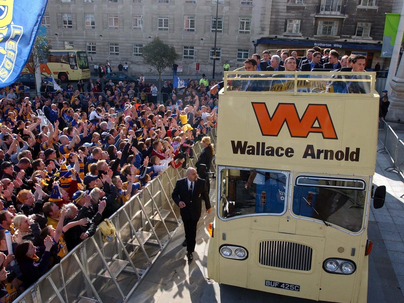 Fans greet the Leeds Rhinos in Millennium Square after the team arrived back from the Powergen Cup final against Bradford Bulls in Cardiff.